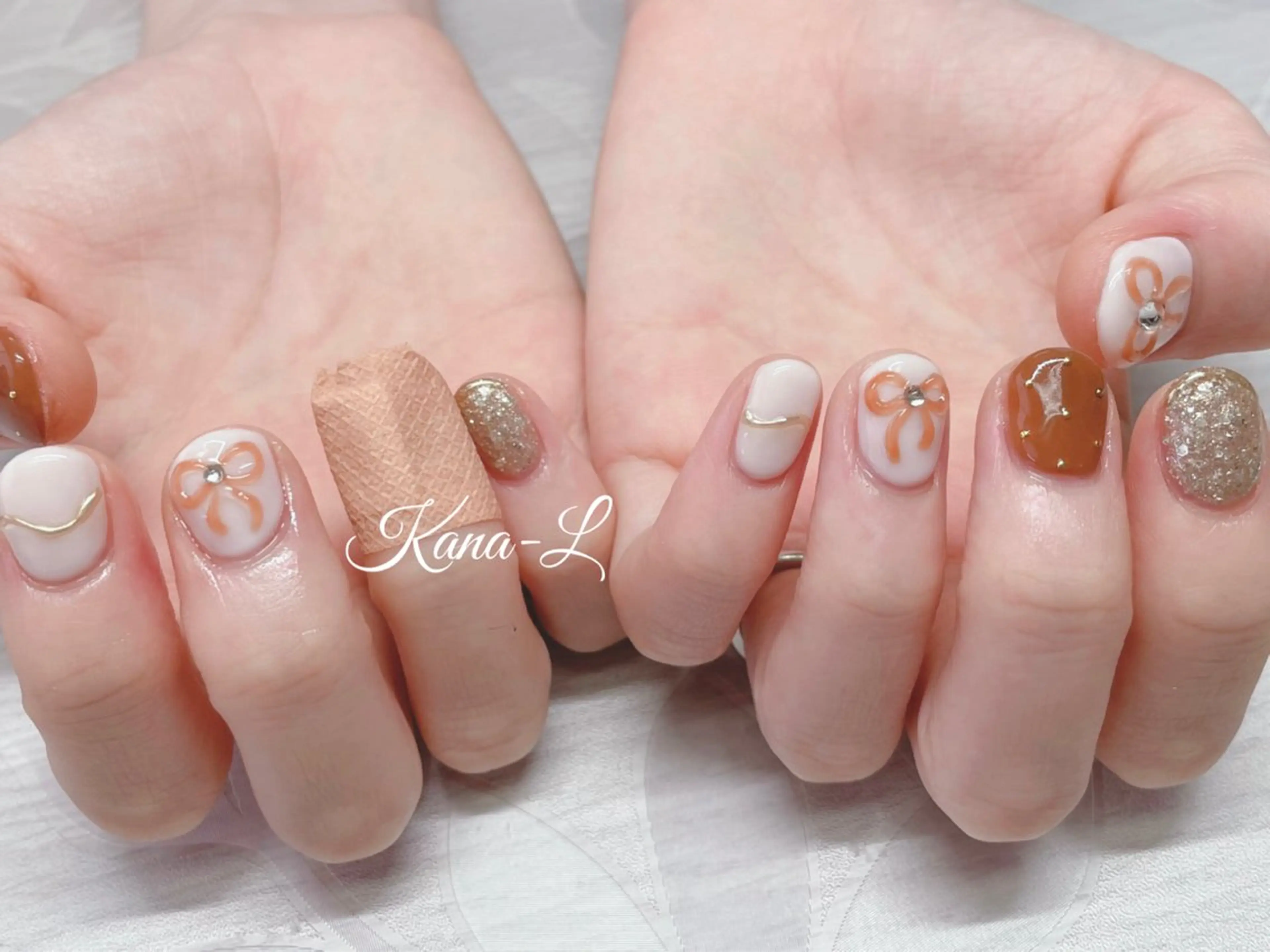 ネイル ジェルネイル ニュアンスネイル パラジェル ぷっくりネイル リボン 芦辺 香奈のネイルデザイン