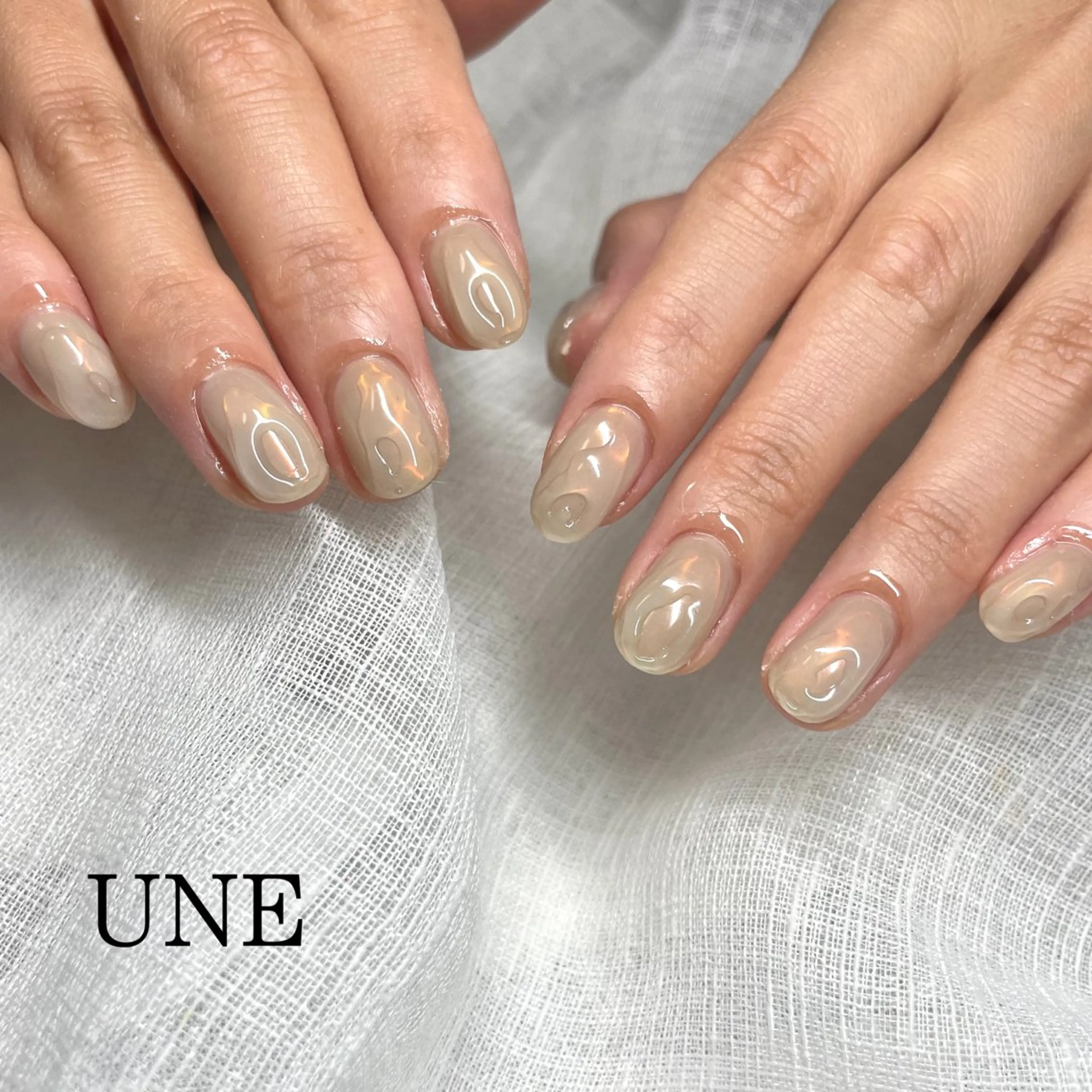 ネイル 氷ネイル・うるうるネイル シンプルネイル UNE.【ユヌ】 Jr.NANAのネイルデザイン