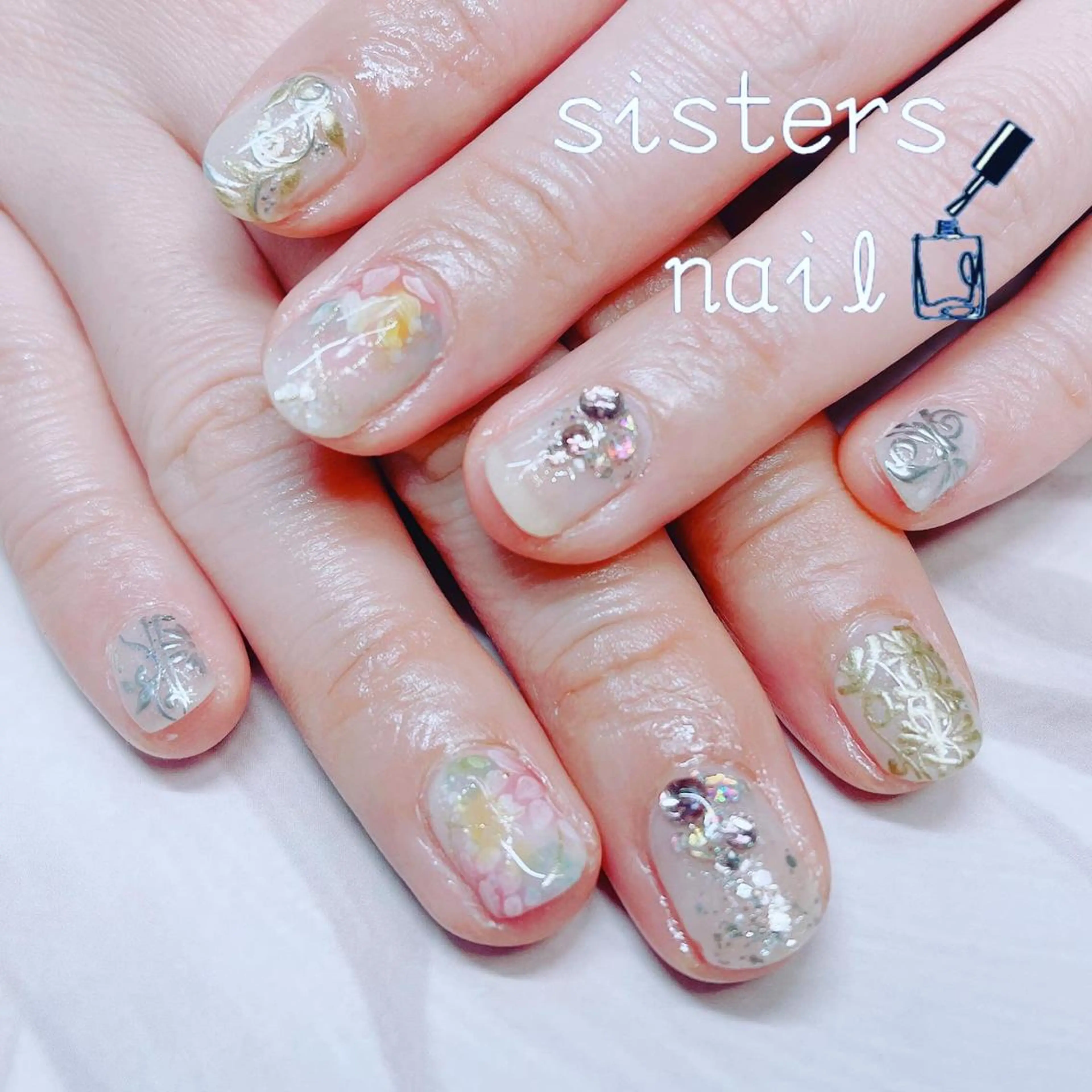 ネイル アートネイル フラワーネイル 春ネイル ハンドネイル ハンドケア sisters nail.fのネイルデザイン