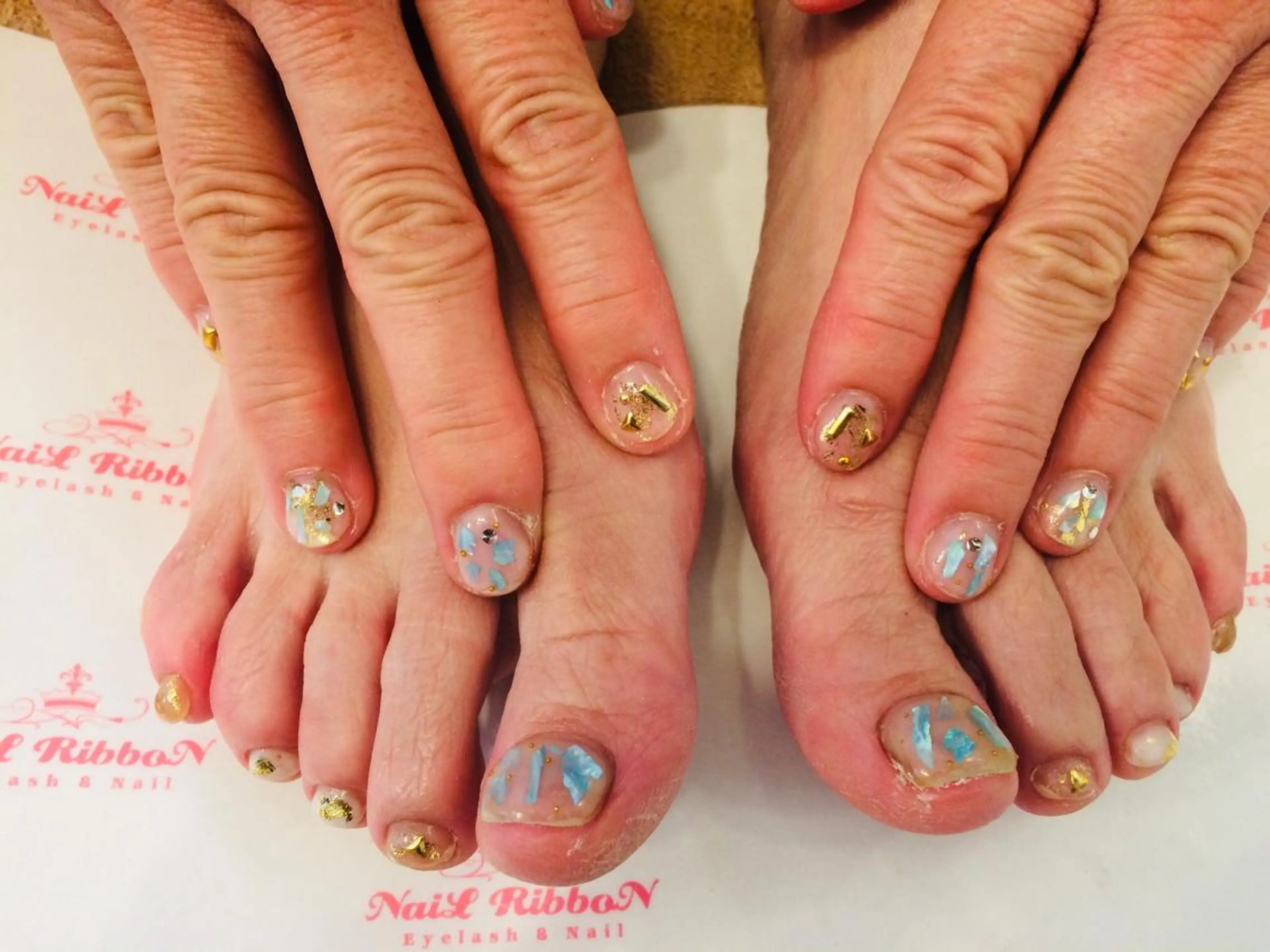 ネイル ネイルリボン 受付スタッフのネイルデザイン
