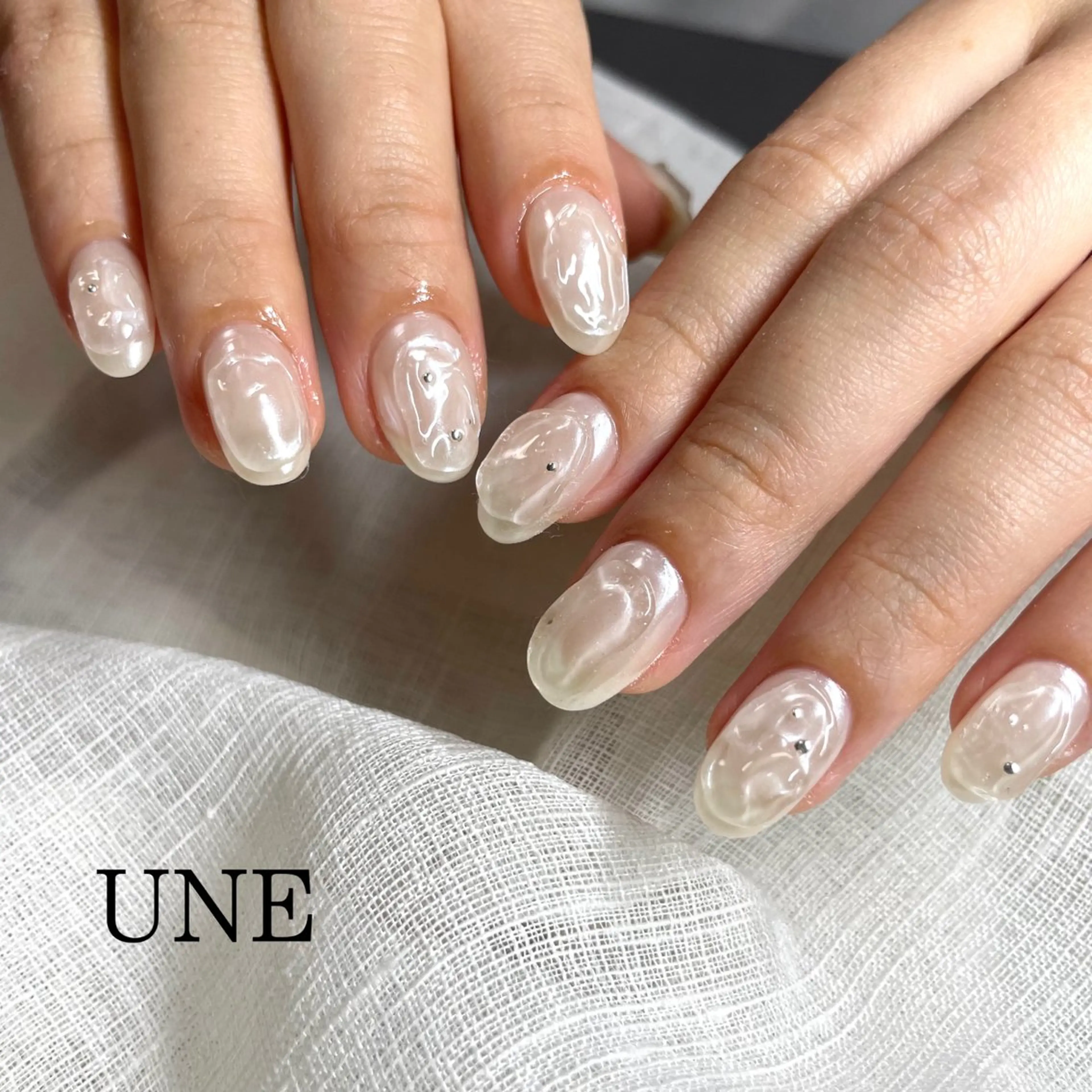 ネイル ホワイト UNE.【ユヌ】 Jr.NANAのネイルデザイン