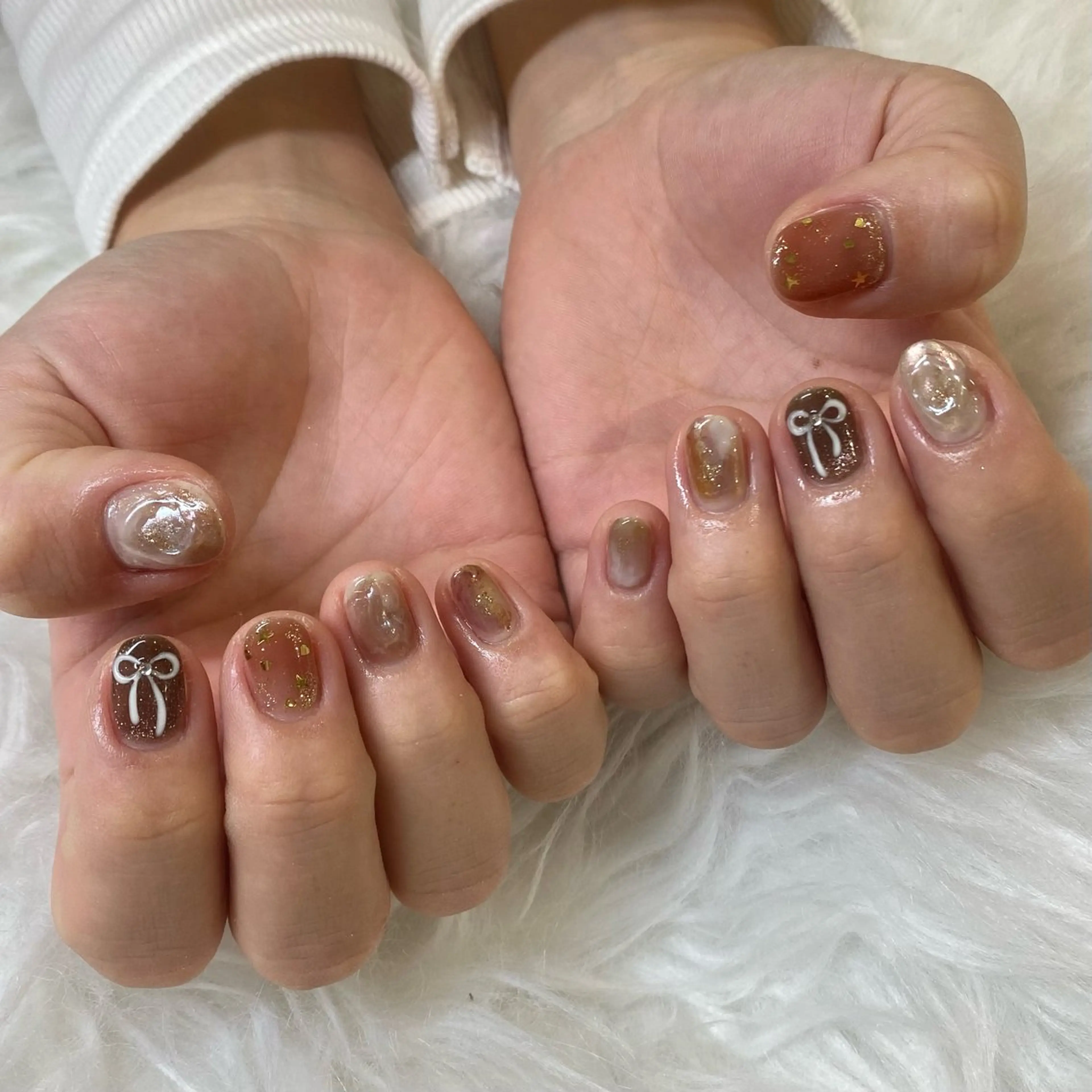 ネイル ニュアンスネイル リボン ハンドネイル WAVY airiのネイルデザイン