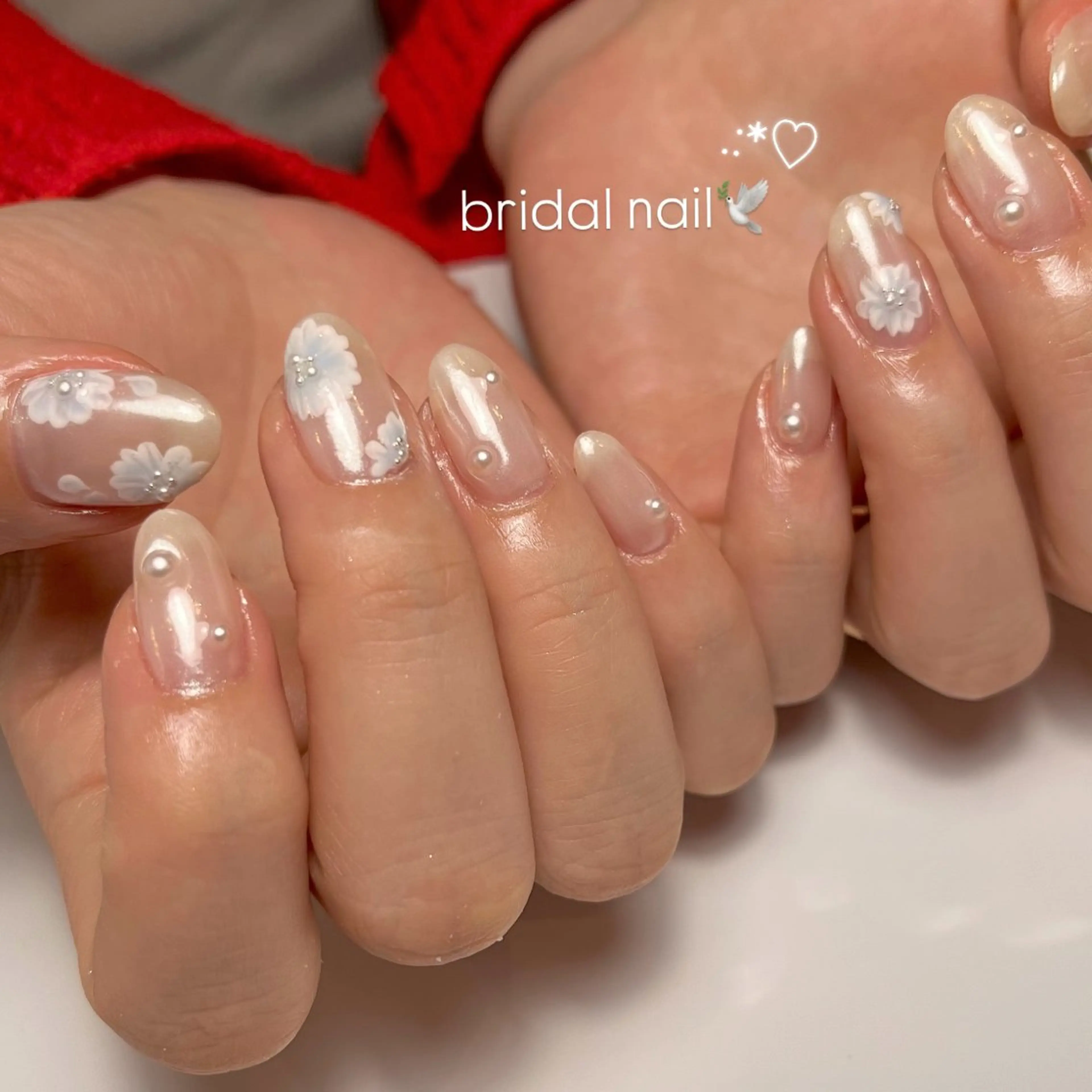 ネイル オーロラネイル ブルー フラワーネイル ブライダルネイル ホワイト ハンドネイル ballie／小野原 なつみのネイルデザイン