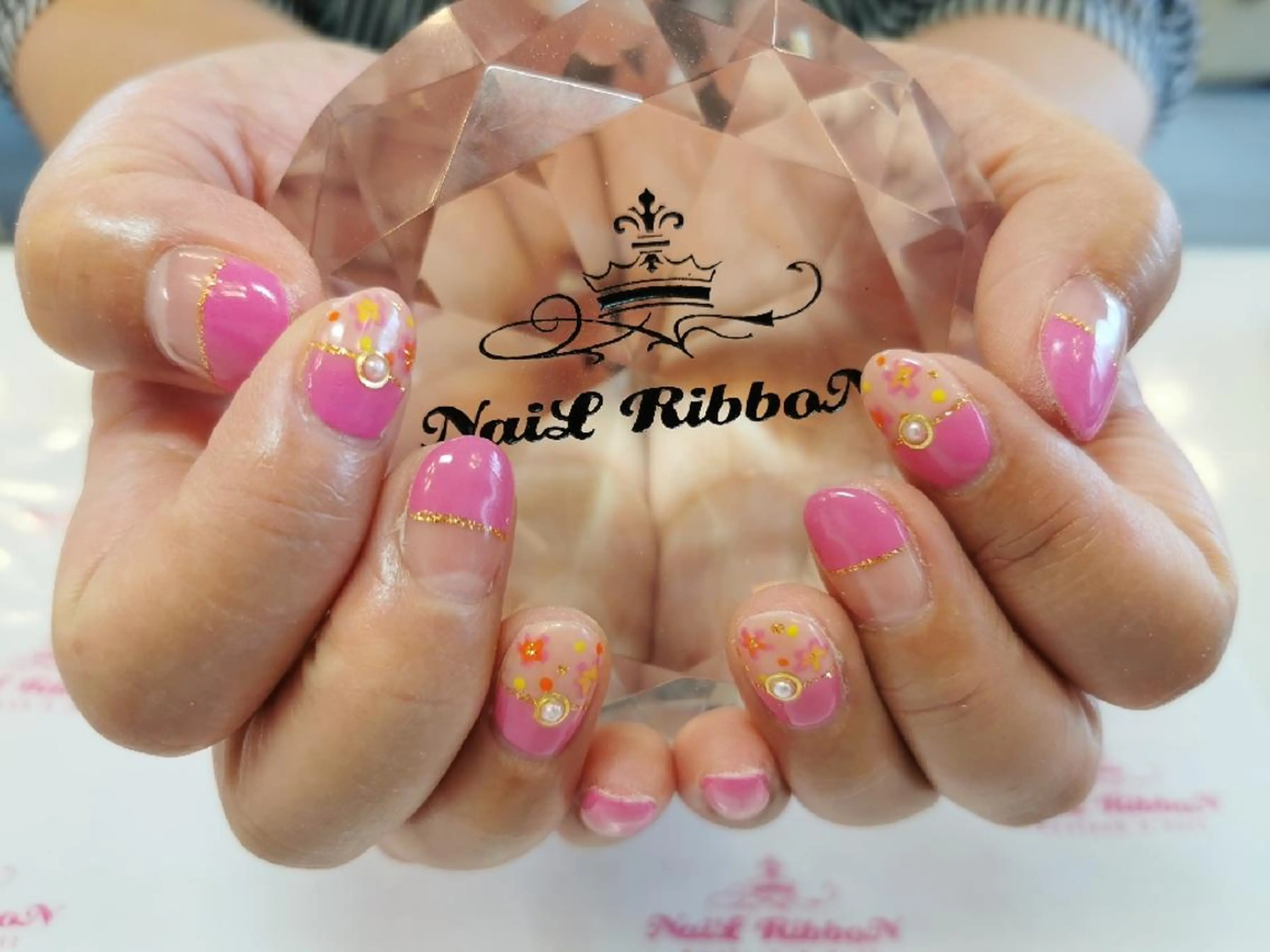 ネイル ネイルリボン 受付スタッフのネイルデザイン