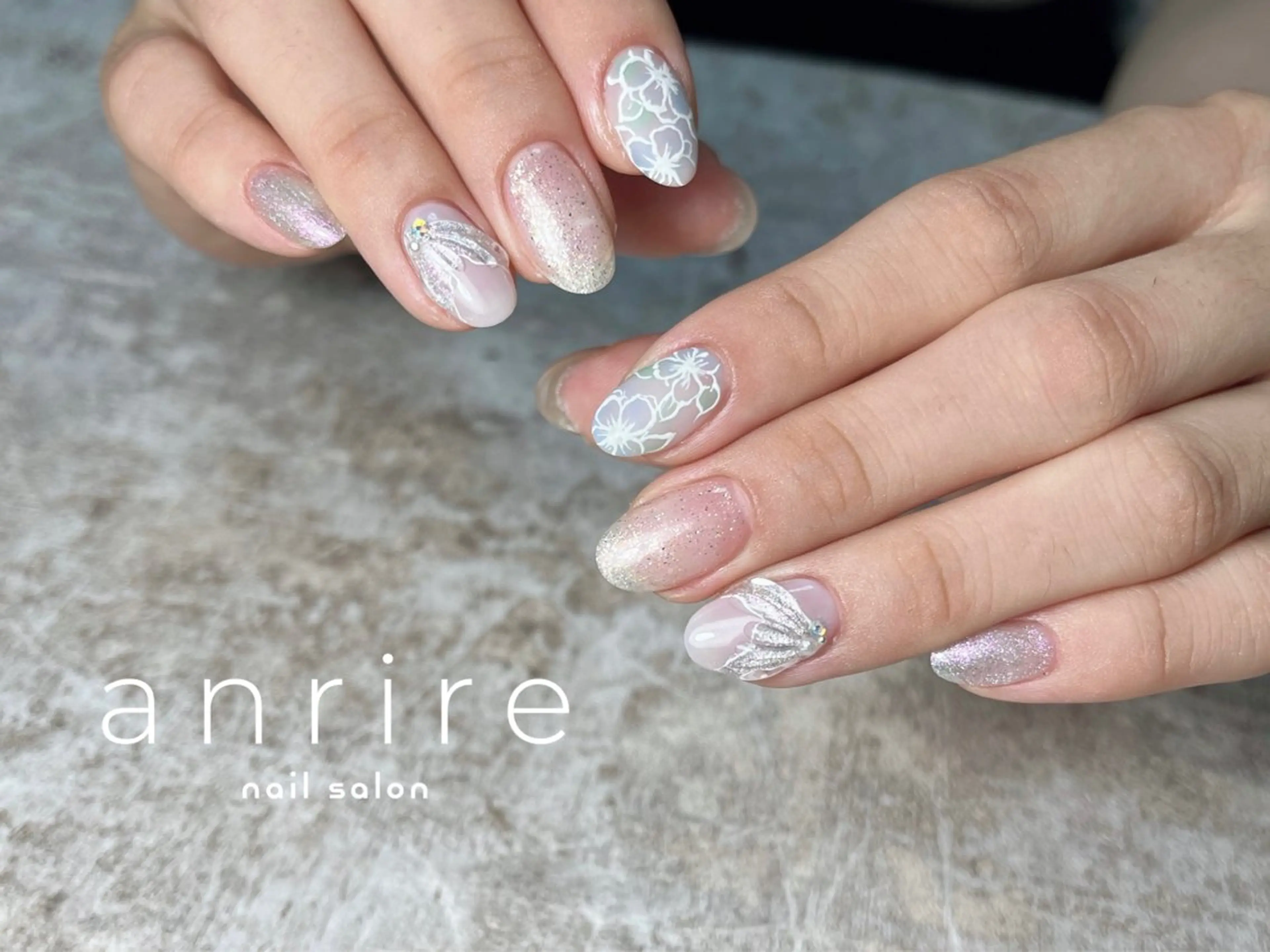 ネイル アートネイル ブルー フラワーネイル ジェルネイル キラキラネイル ハンドネイル nailsalon anrireのネイルデザイン
