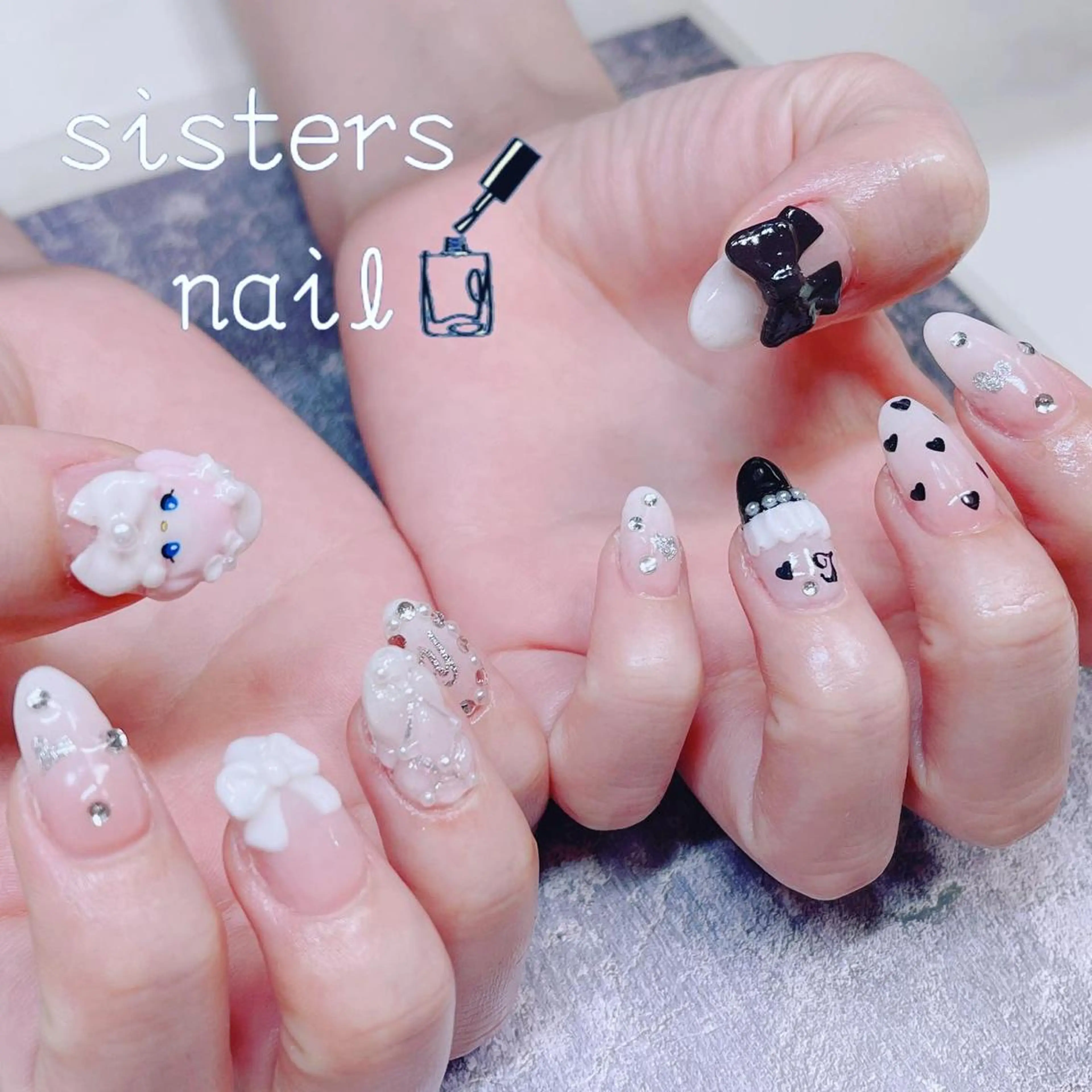 ネイル アートネイル リボン ハンドネイル ハンドケア sisters nail.fのネイルデザイン
