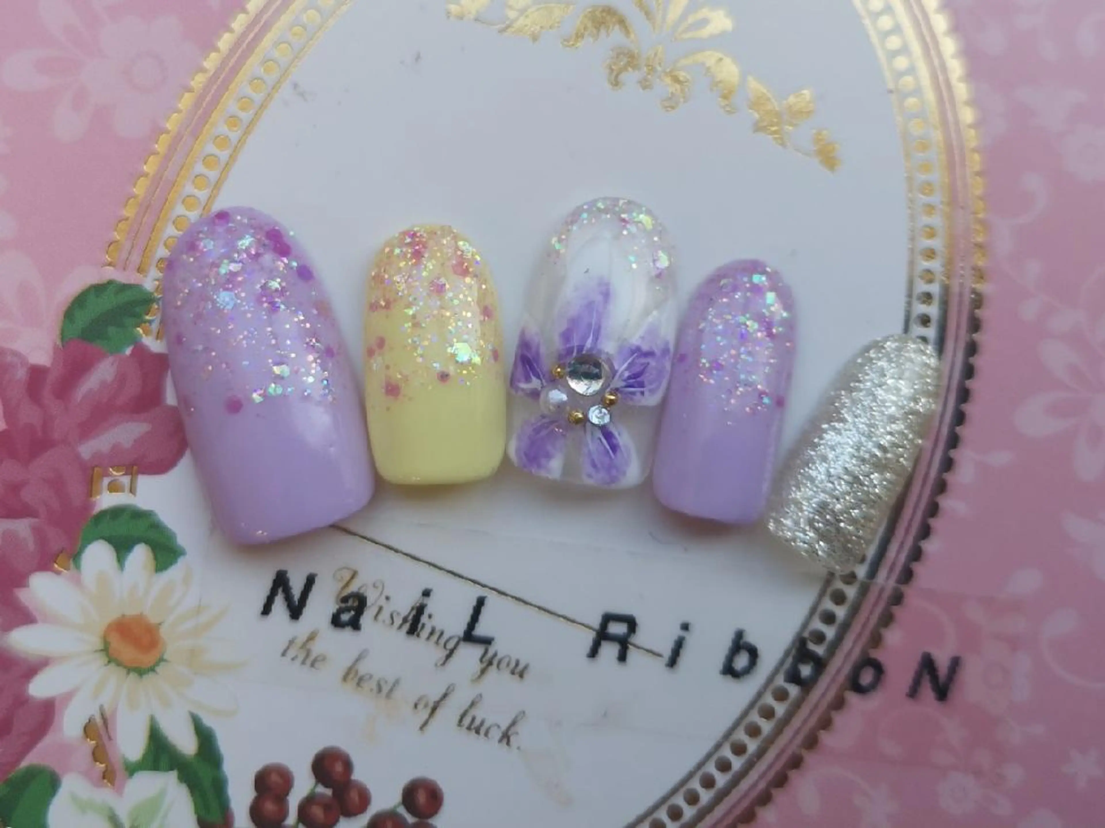 ネイル ネイルリボン 受付スタッフのネイルデザイン