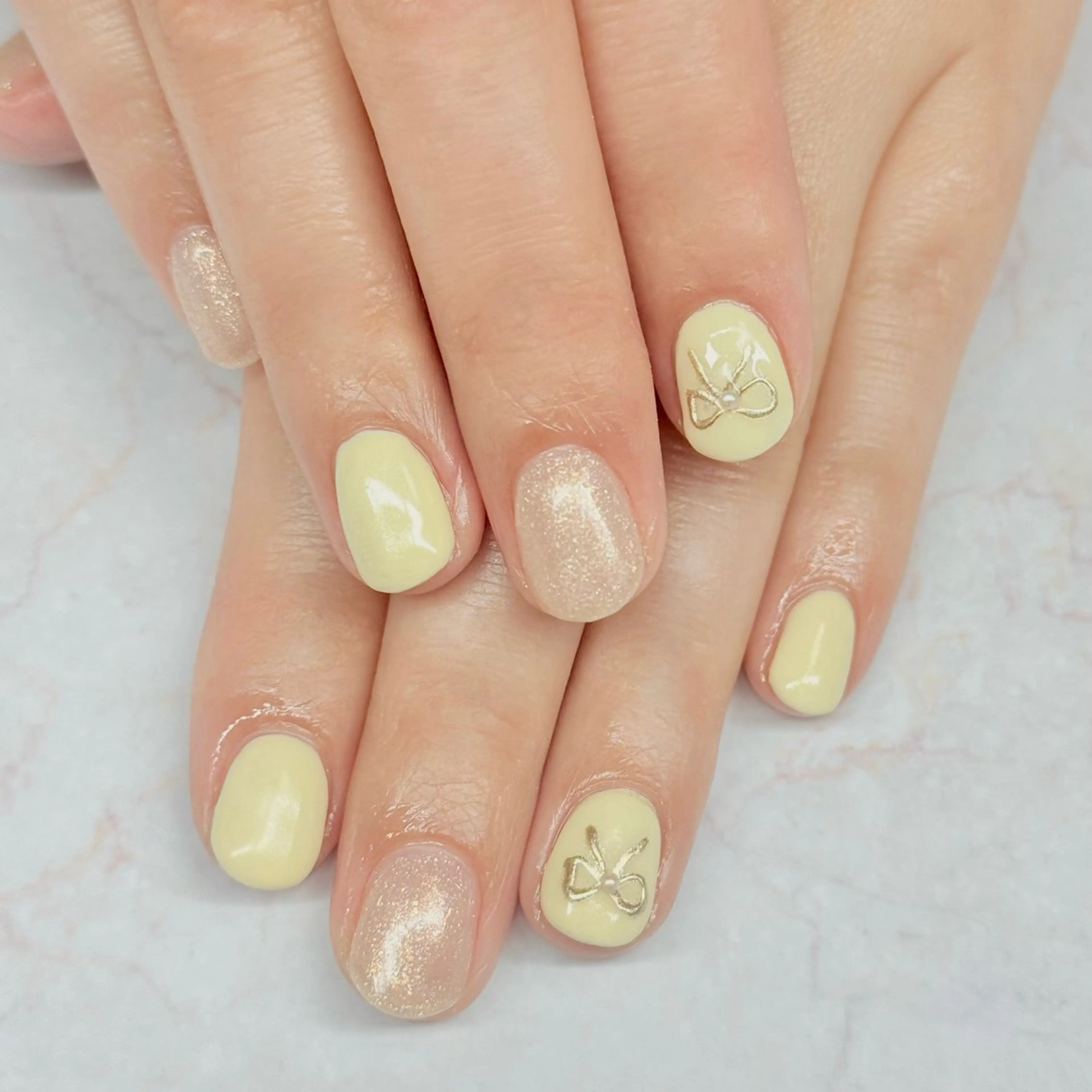 ネイル リボン 黄色 ハンドネイル flan ゆいのネイルデザイン