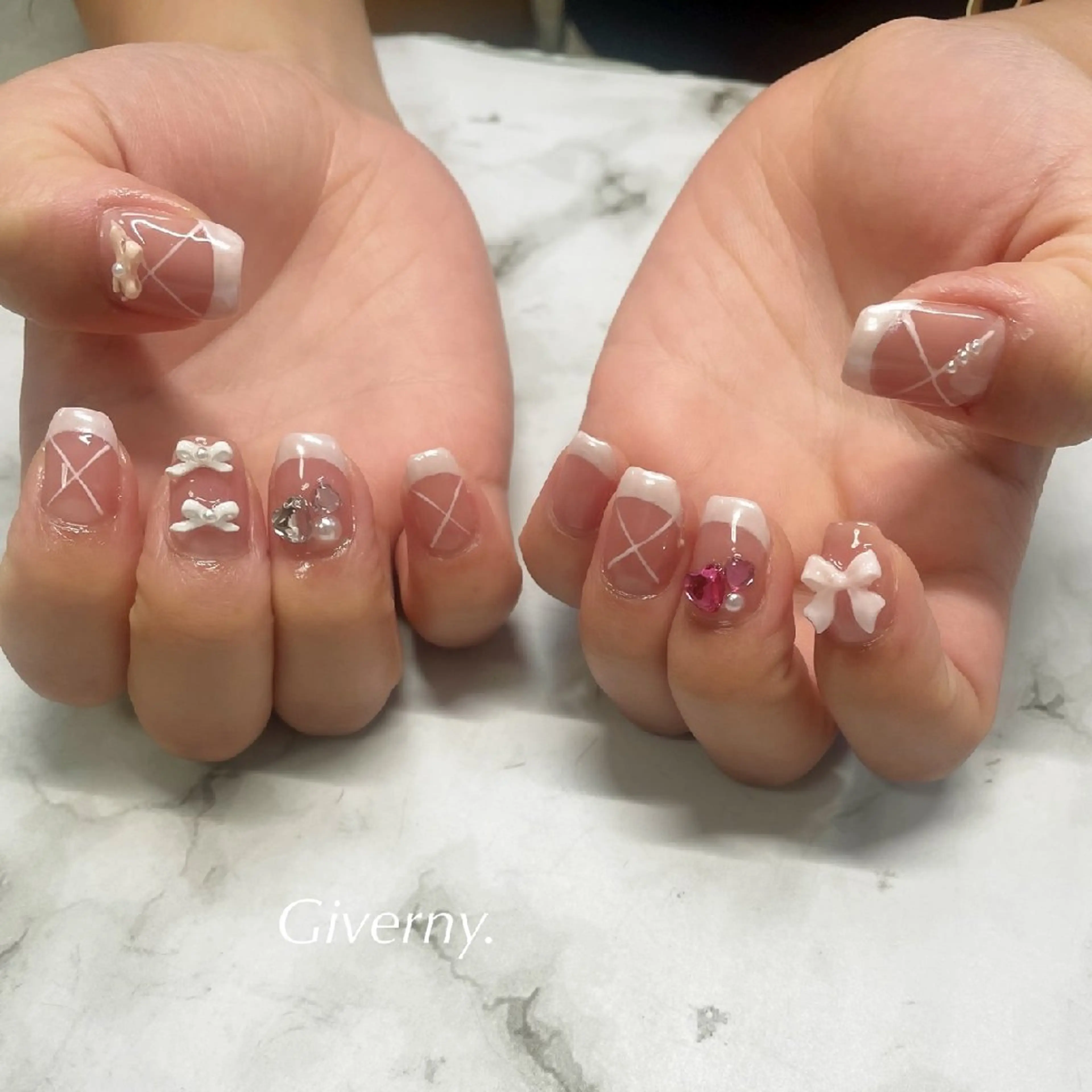 ネイル フレンチネイル ハート ミラーネイル ピンク リボン ハンドネイル Giverny .のネイルデザイン