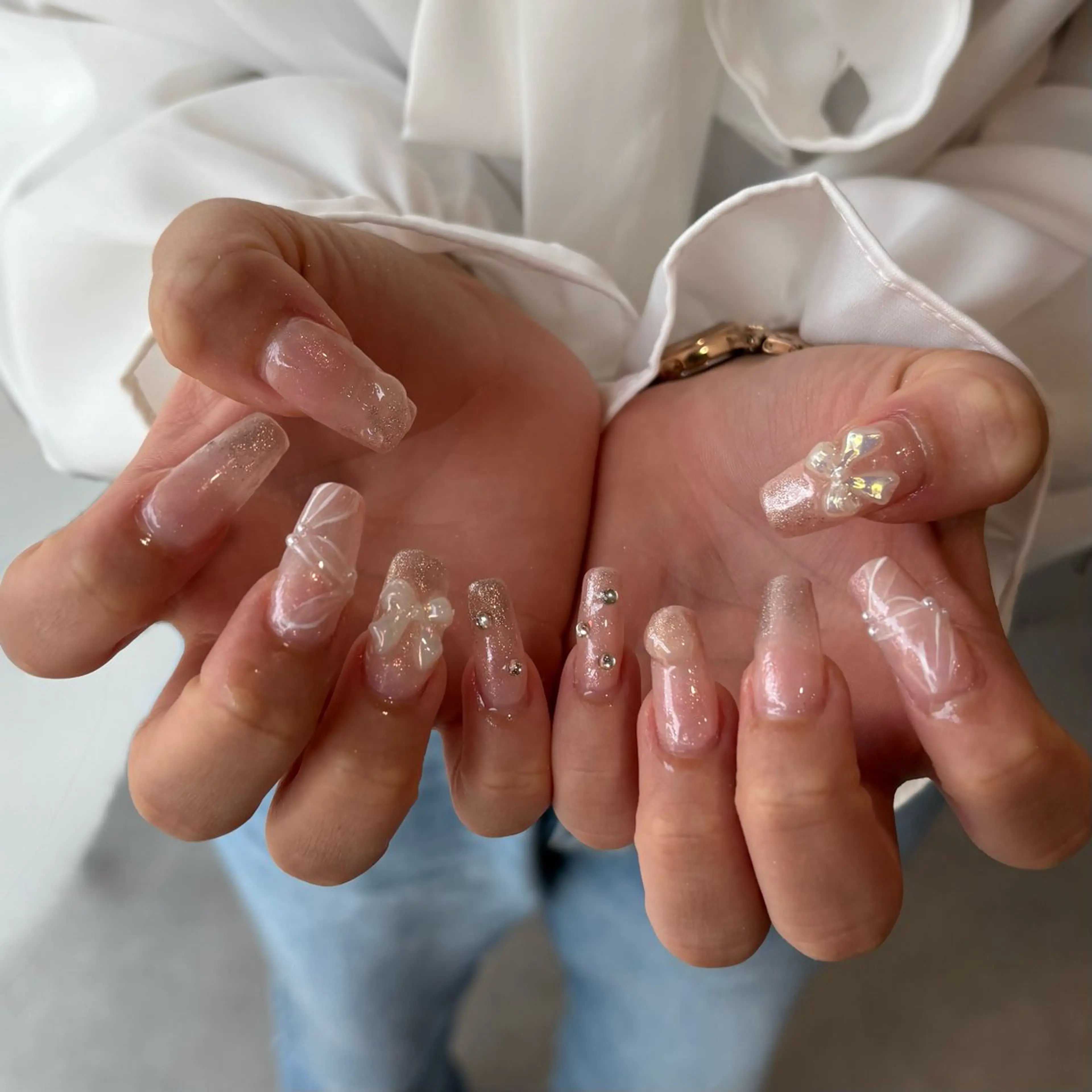 ネイル アートネイル 氷ネイル・うるうるネイル 韓国ネイル ニュアンスネイル リボン Vante梅田店所属・vante_aimi .パラジェル取扱店のネイルデザイン