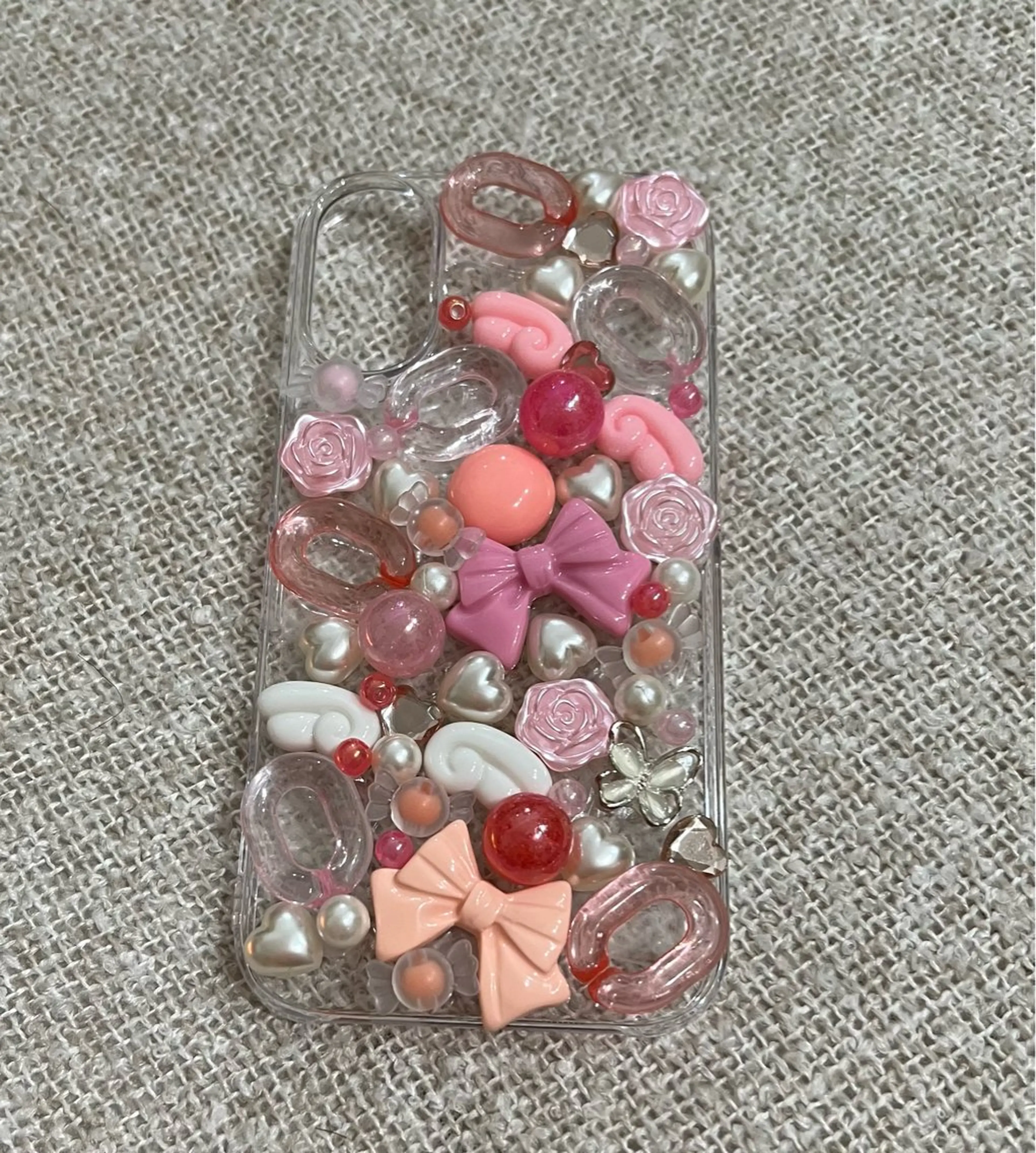 iPhoneデコ2000円から^ ^イニシャルやパーツなどにも対応♡の写真