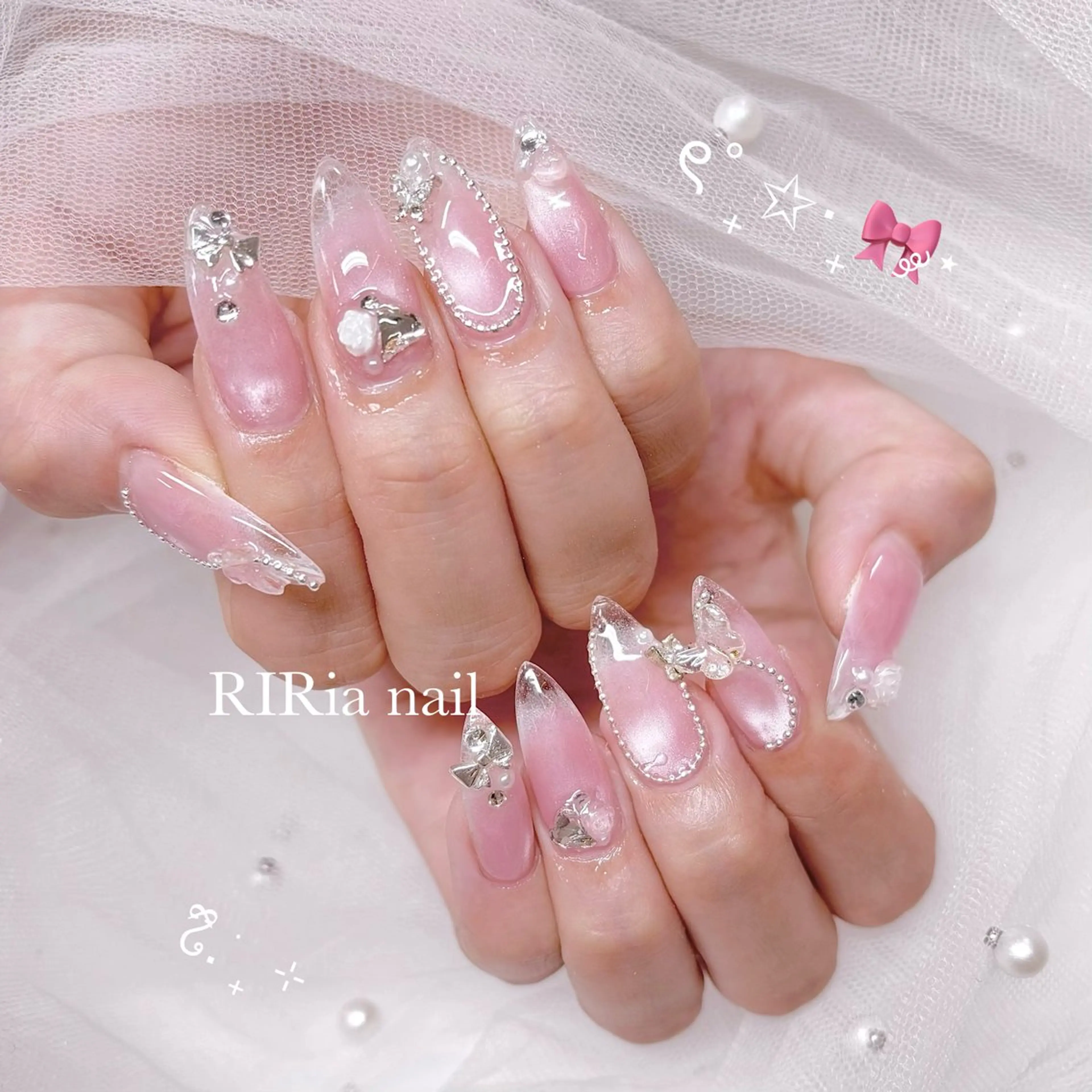 ネイル ピンク リボン ハンドネイル RIRia .のネイルデザイン