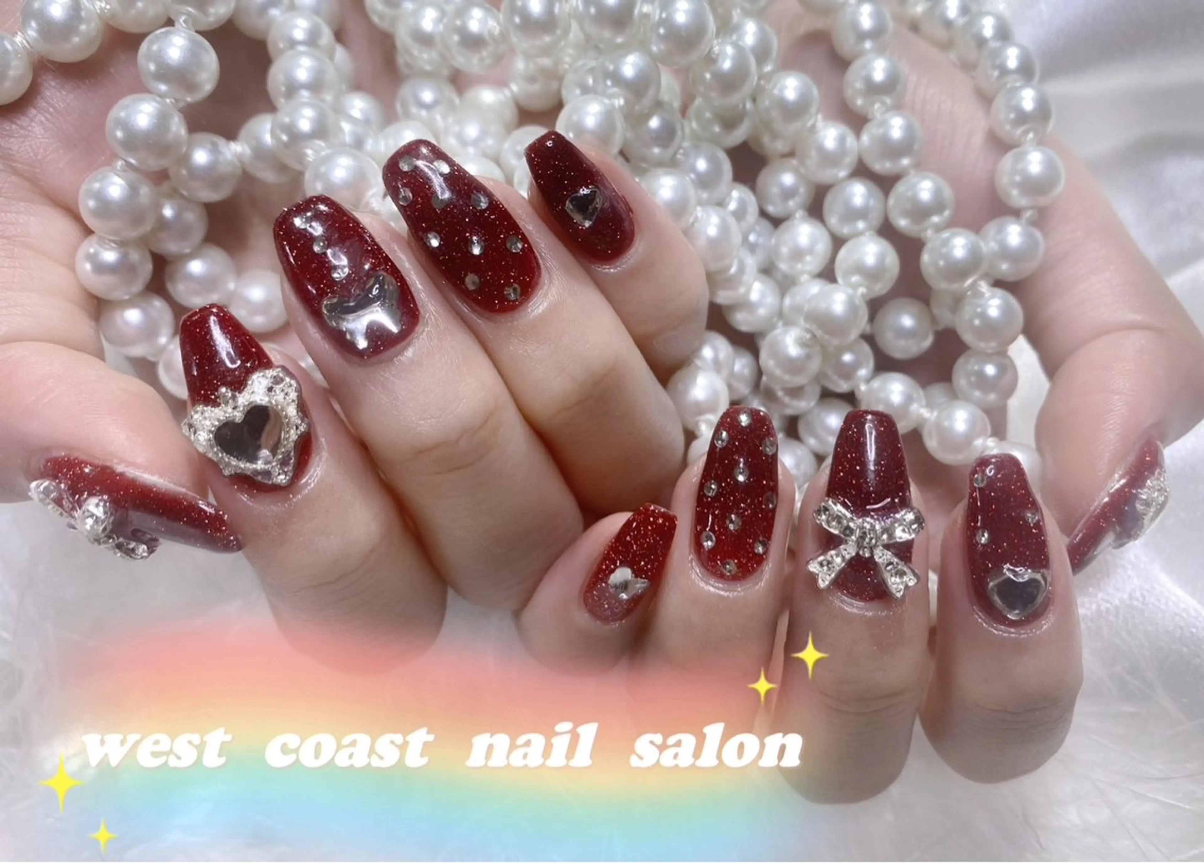 ネイル 赤色 バレンタイン ハンドネイル リボン、ガーリー パーツ放題専門店のネイルデザイン