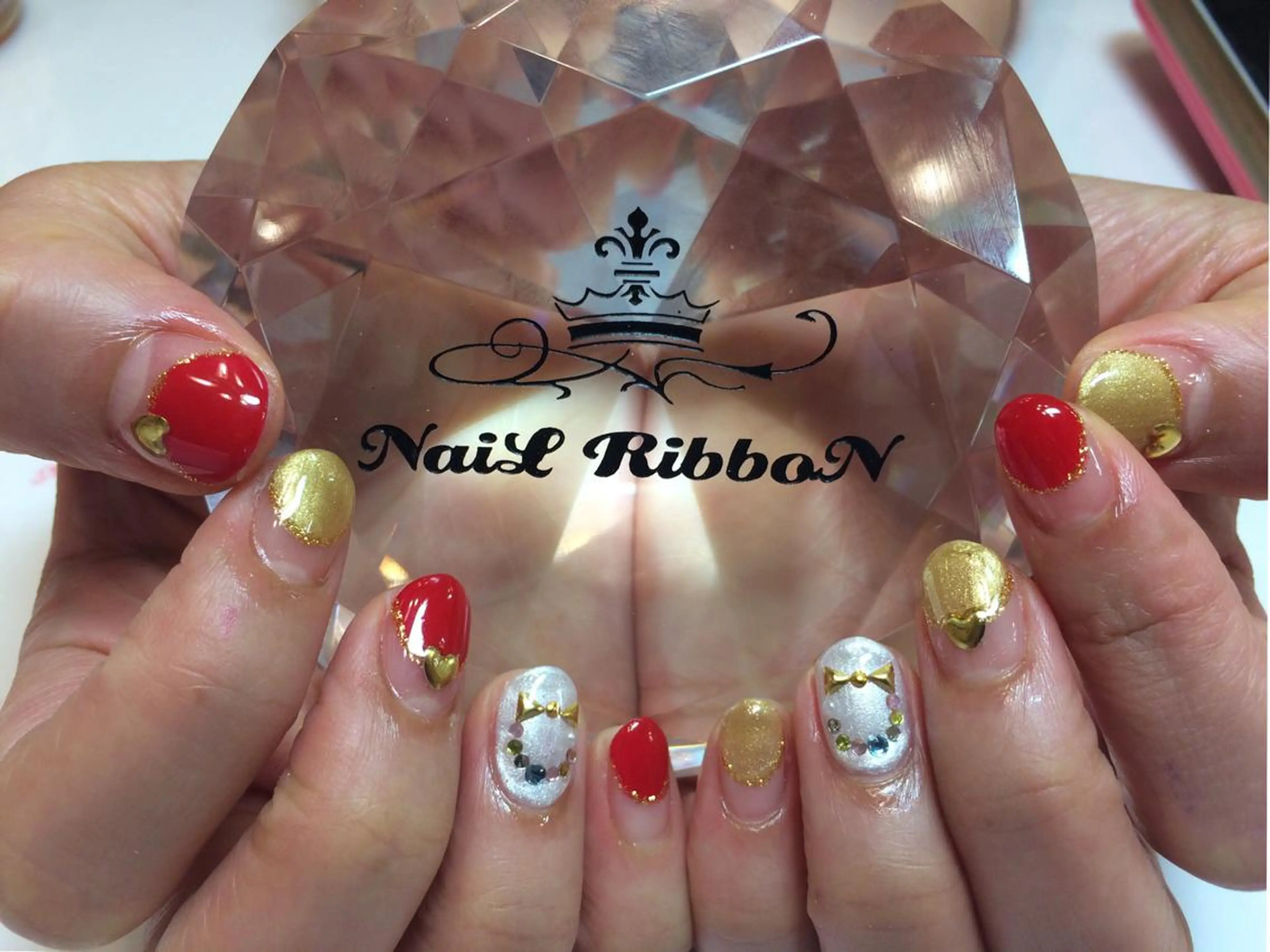 ネイル ネイルリボン 受付スタッフのネイルデザイン
