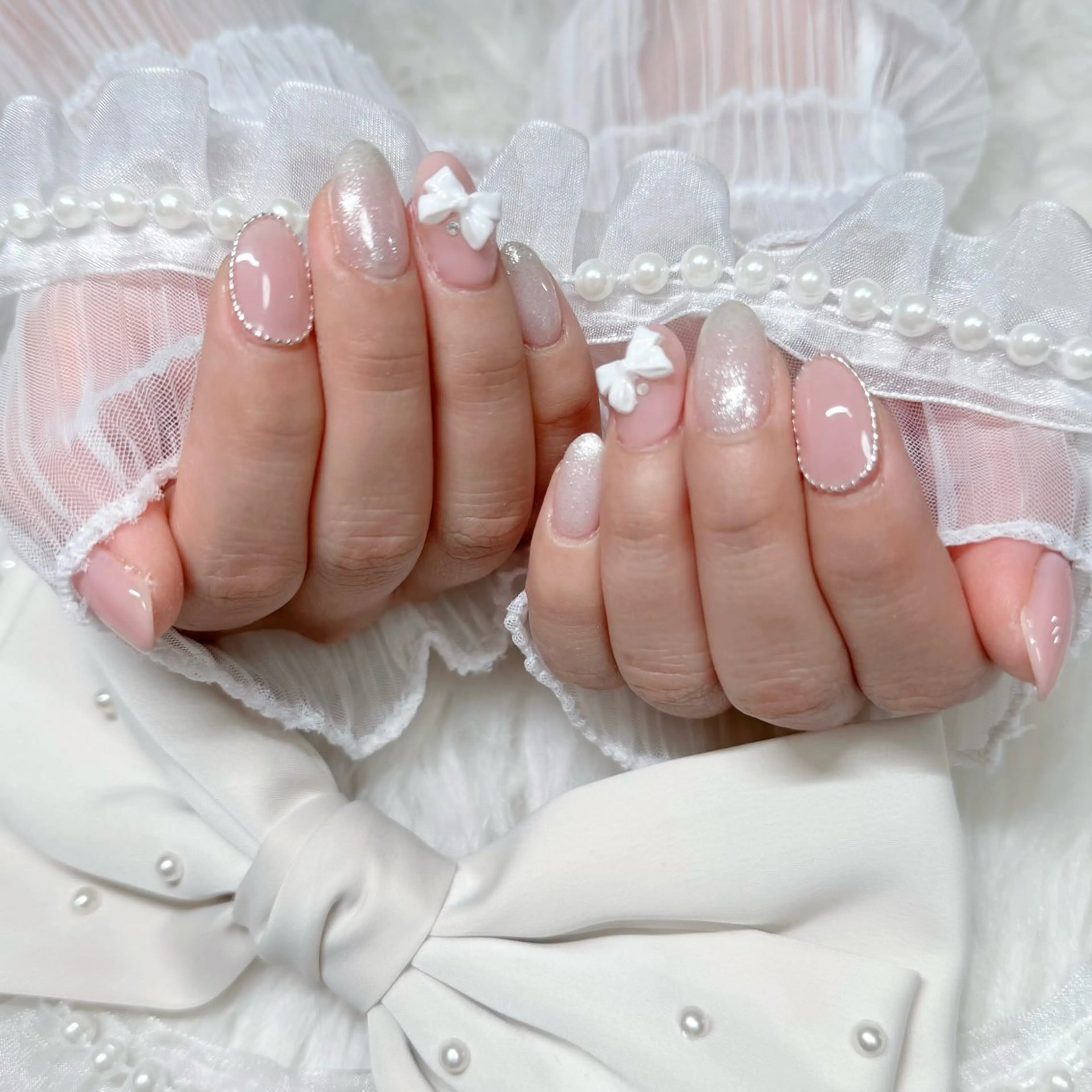 ネイル ガーリー リボン ハンドネイル ✩.*🎀 aoi🎀のネイルデザイン