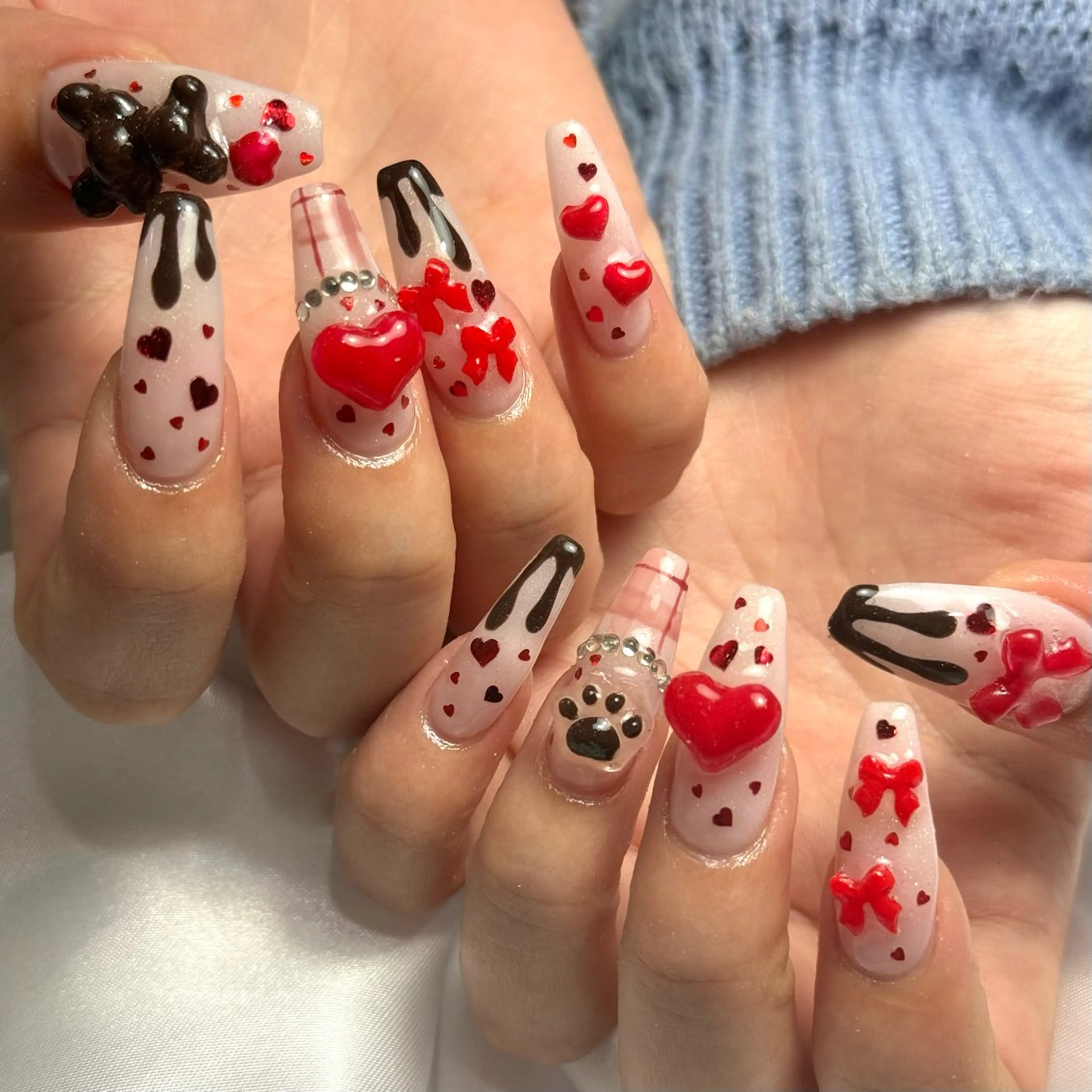 ネイル ハート リボン バレンタイン Ray nail natsu🎀のネイルデザイン