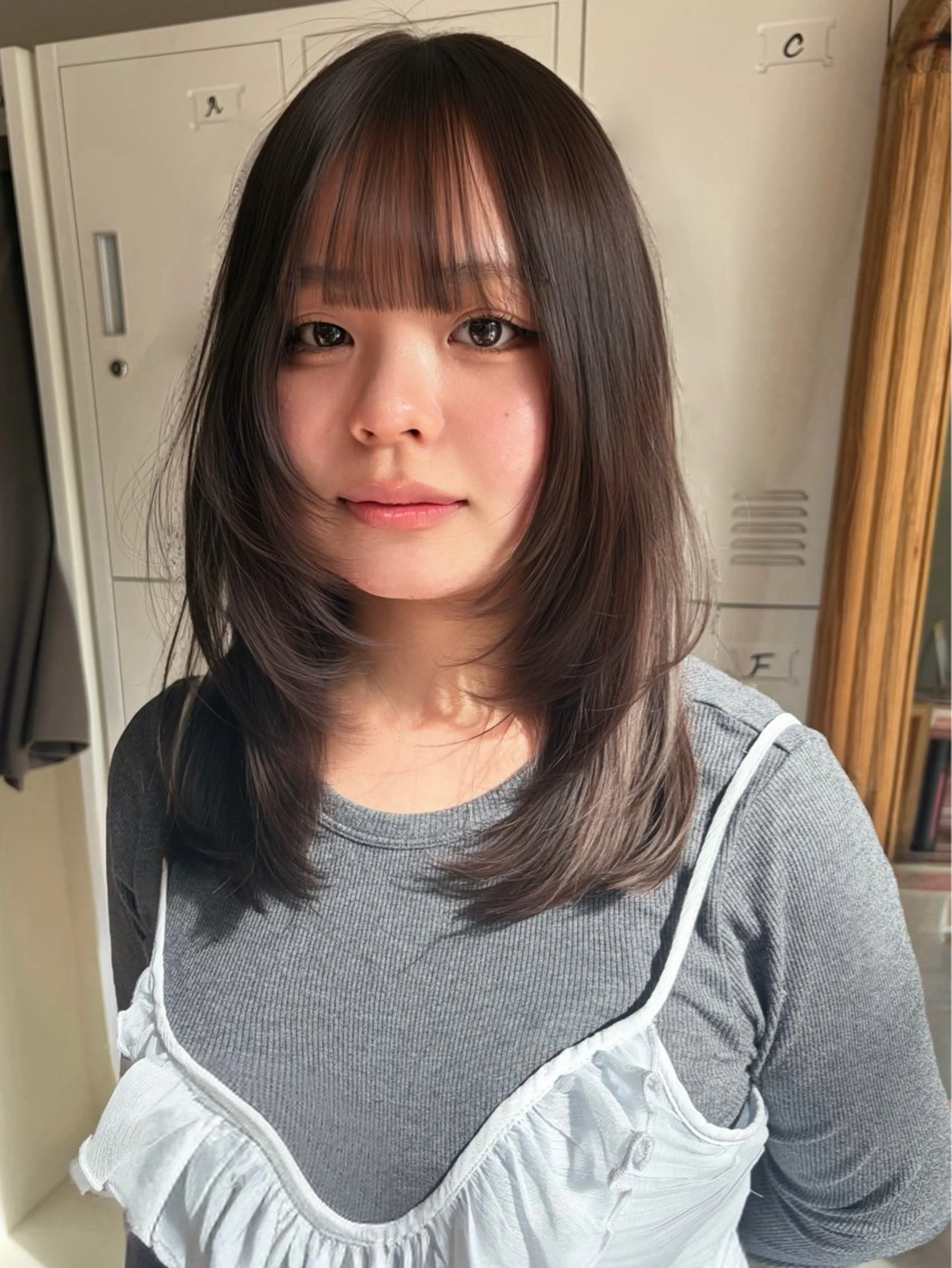 セミロング レイヤーカット/ 酸性ストレート梅田のヘアスタイル