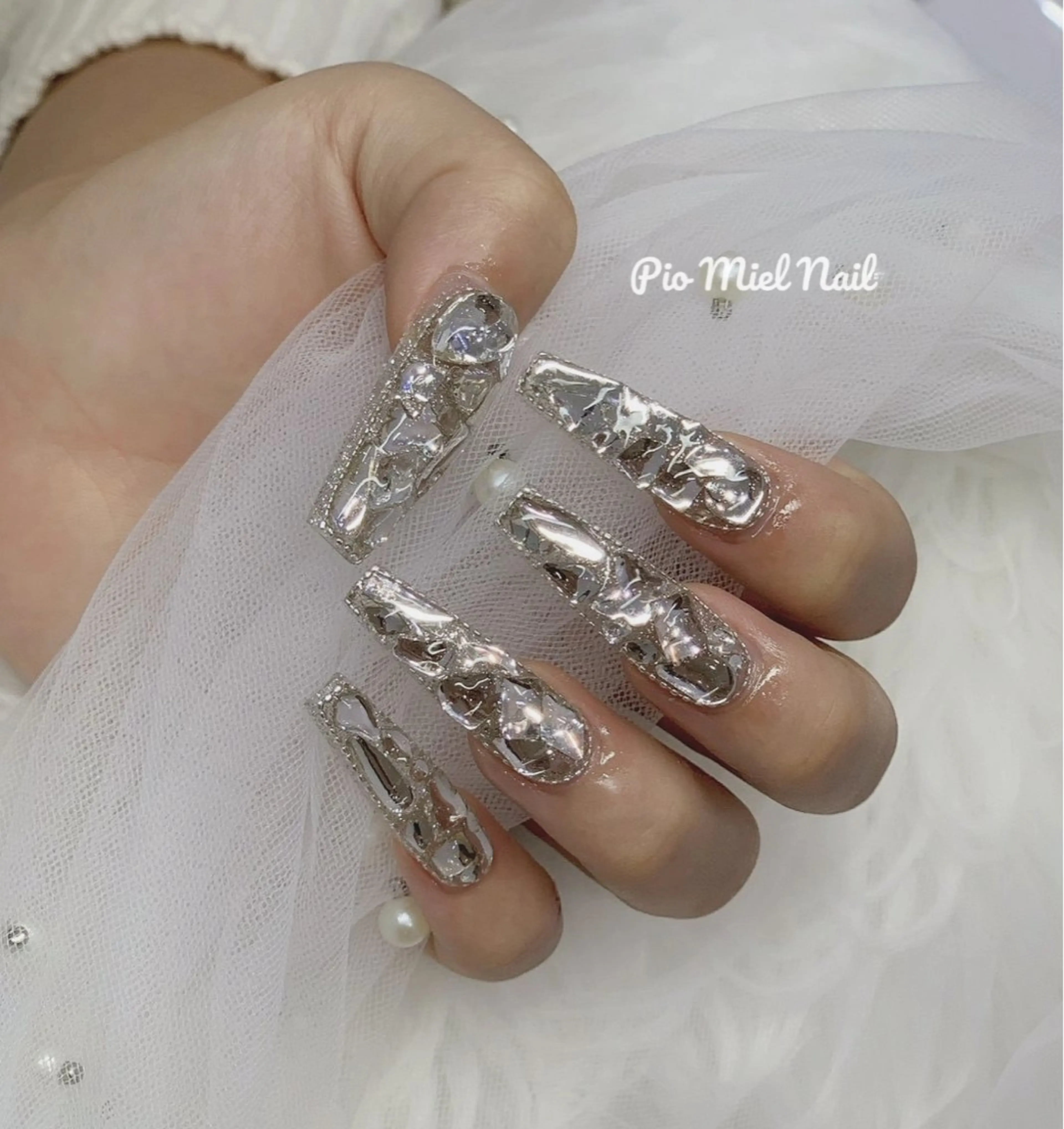 ロング ハンドネイル ハンドケア Pio Mielのネイルデザイン