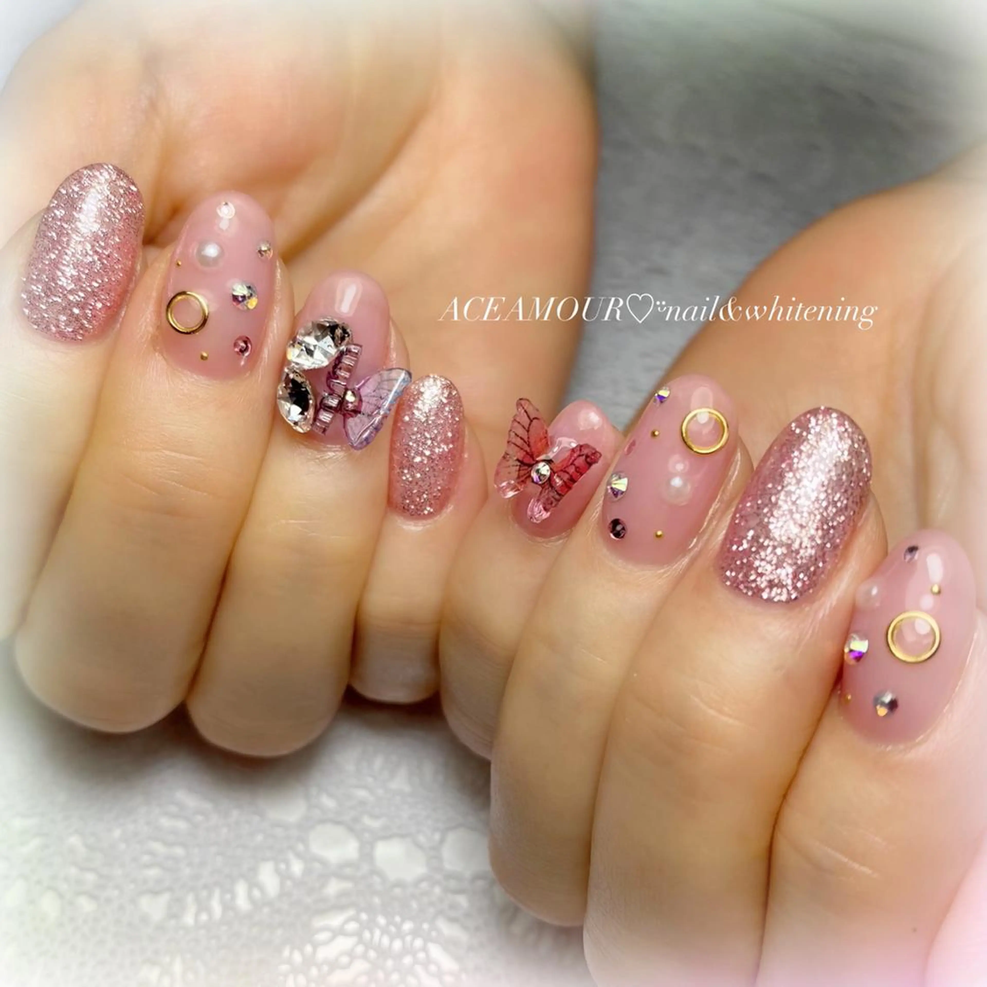 ネイル アートネイル ピンク ストーンネイル ネイル/耳つぼ /新ホワイトニングのネイルデザイン