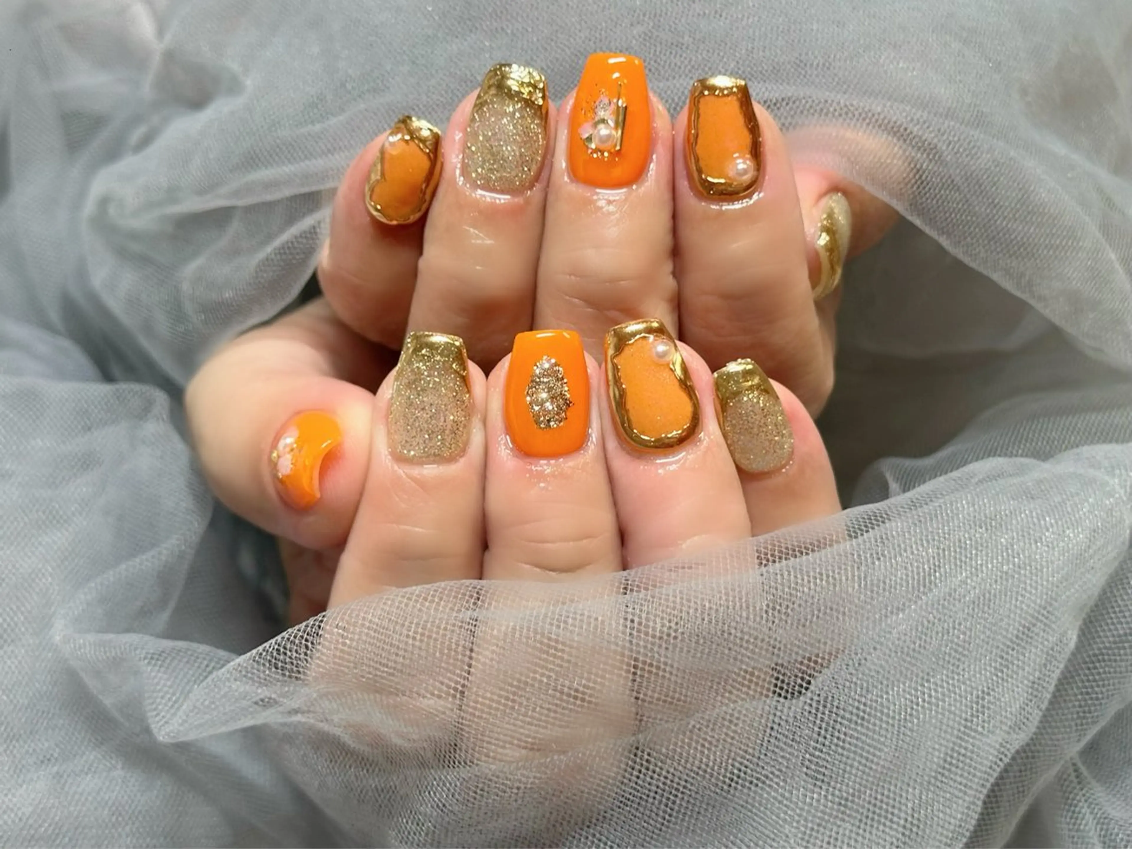 ネイル ゴールド ニュアンスネイル オレンジ ハンドネイル Nail Salon KURELLYのネイルデザイン