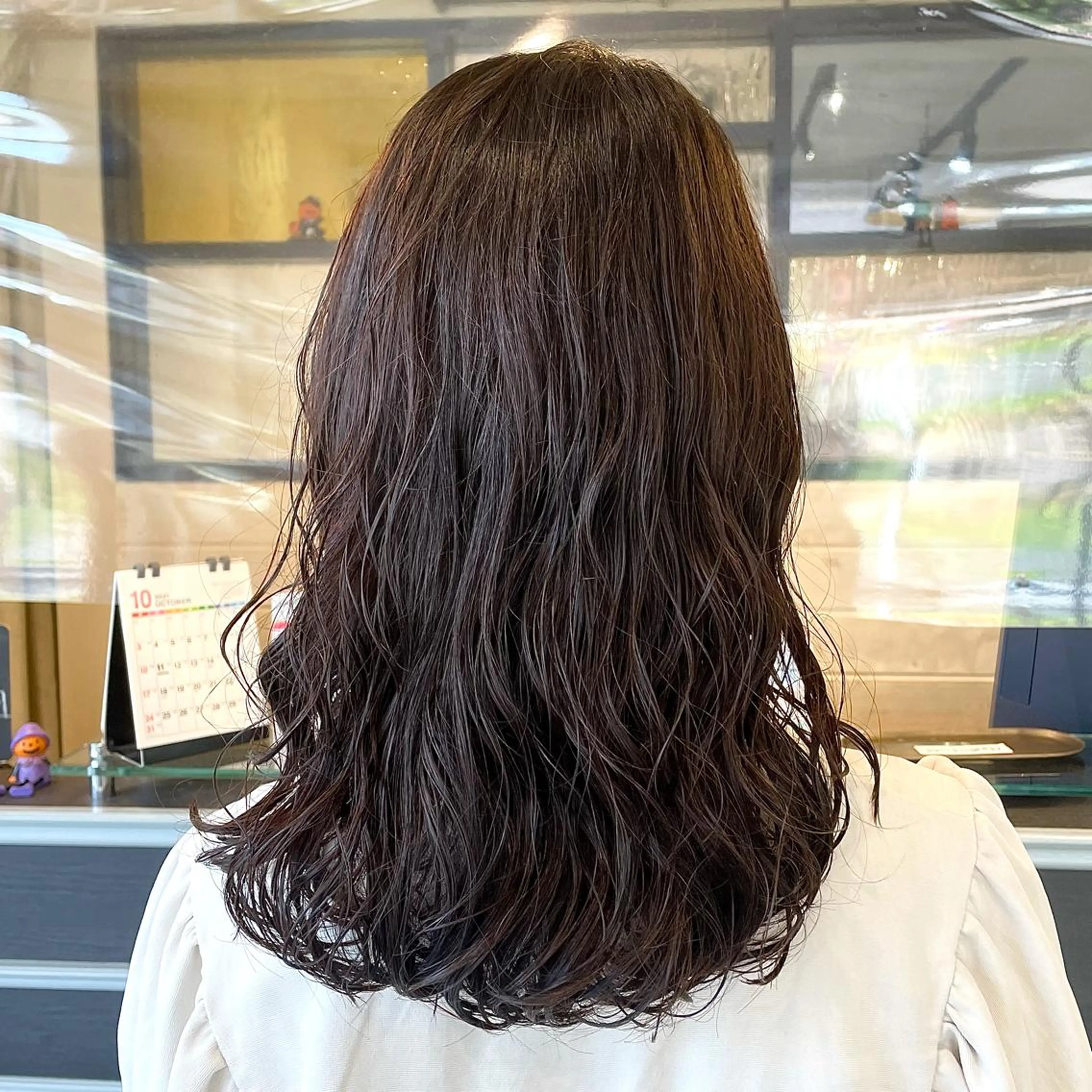 セミロング パーマ スナコザワ レナのヘアスタイル
