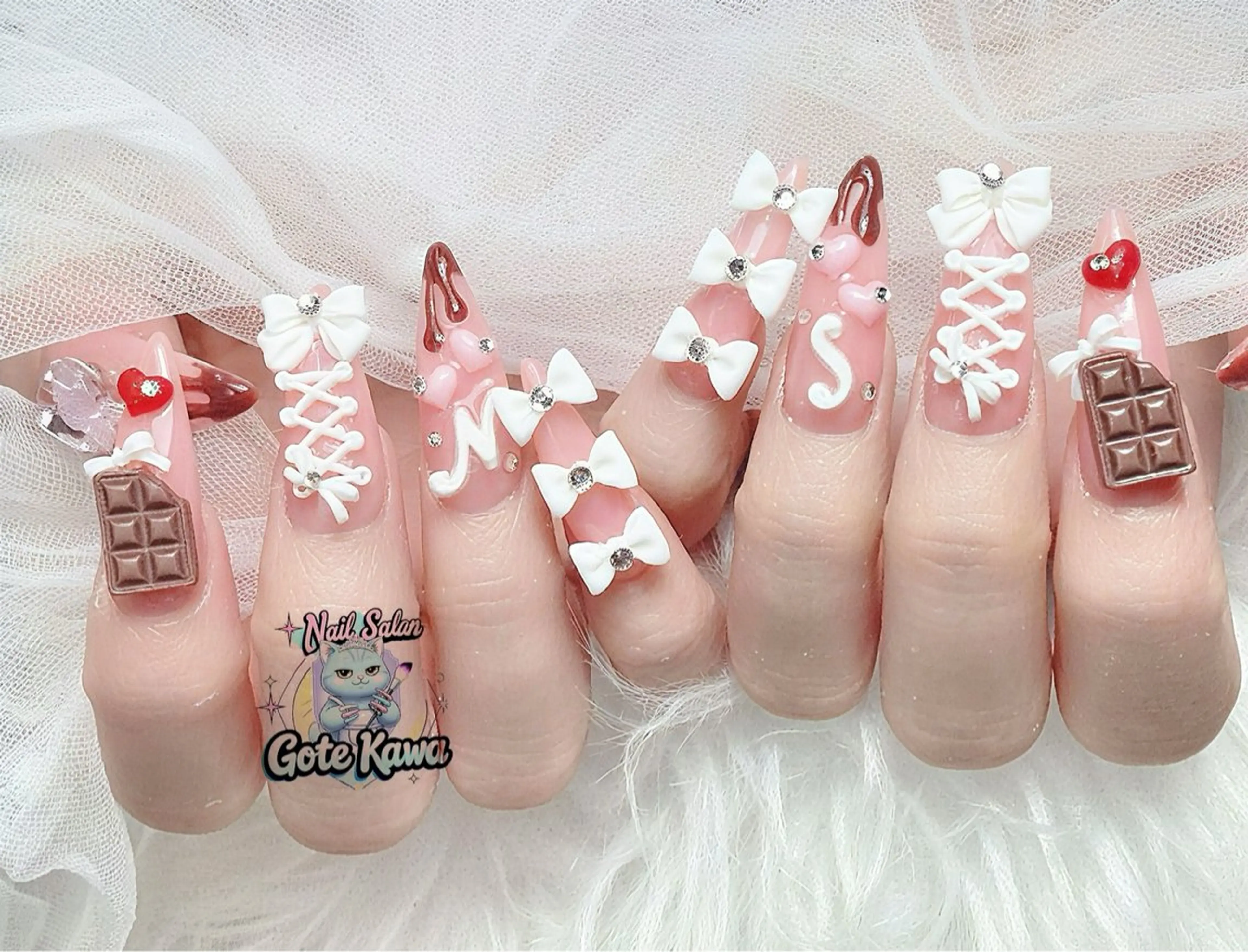 ネイル ピンク リボン ハンドネイル ハンドケア Gote Kawa nail salonのネイルデザイン