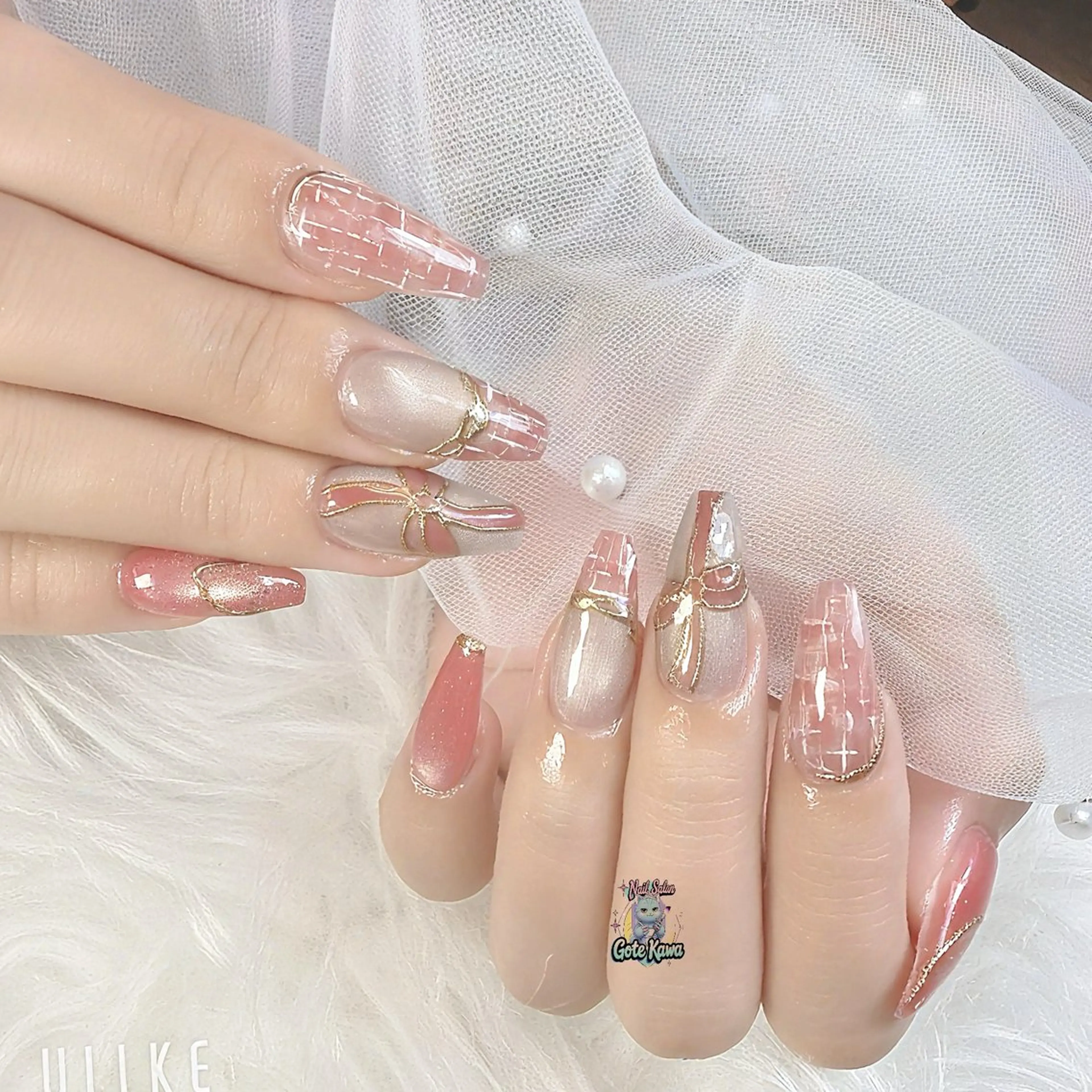 ネイル キラキラネイル ロングネイル 持ち込み ピンク リボン ハンドネイル ハンドケア Gote Kawa nail salonのネイルデザイン