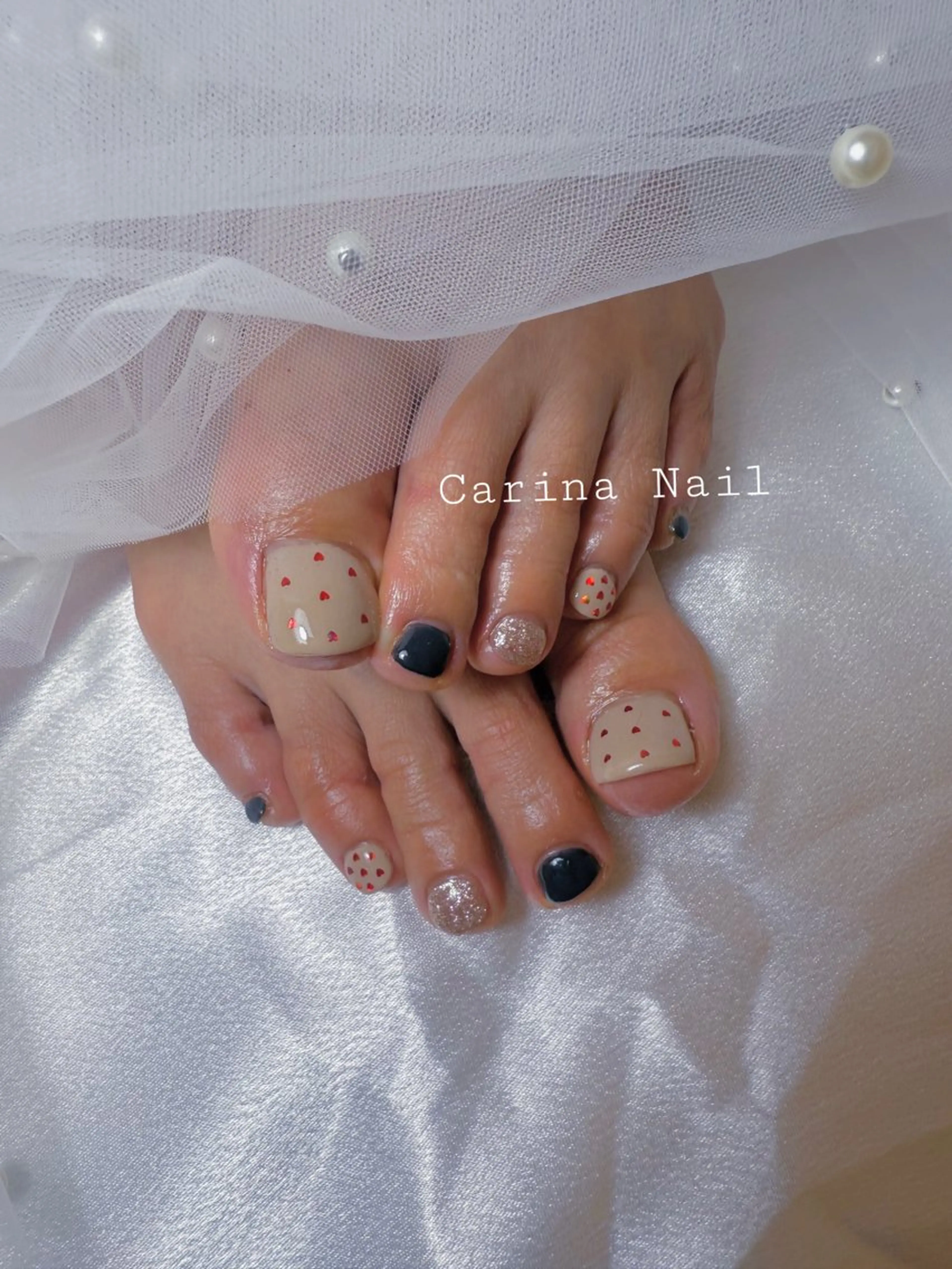 ネイル 赤色 シンプルネイル フットネイル Carina Nail所属・Carina Nailのネイルデザイン