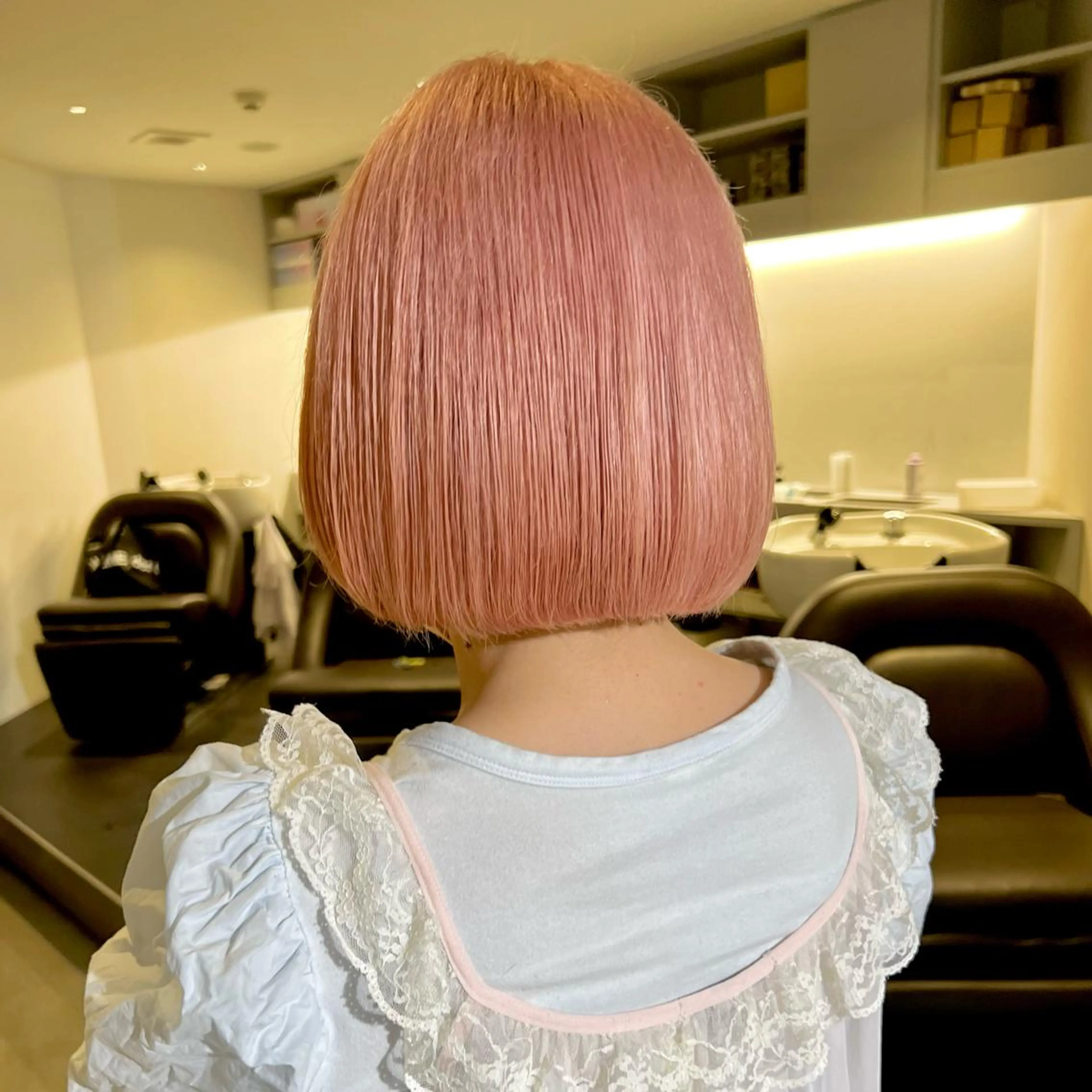 ミディアム カラー ブリーチ ハイトーンカラー オレンジ オレンジピンク ピンクカラー RAIMA ケアハイトーンのヘアスタイル