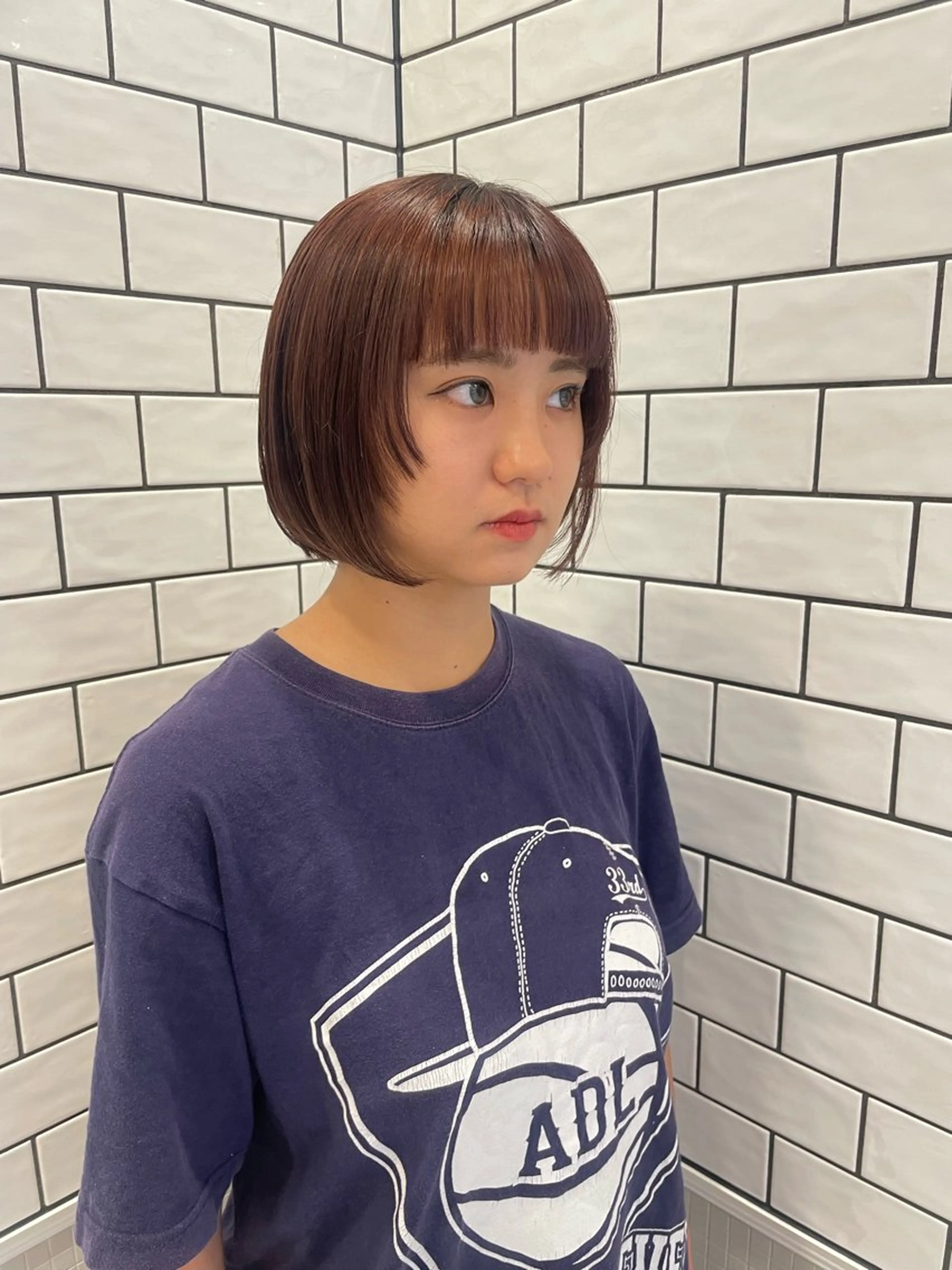 ミディアム カット MIFA レイヤー／パーマのヘアスタイル