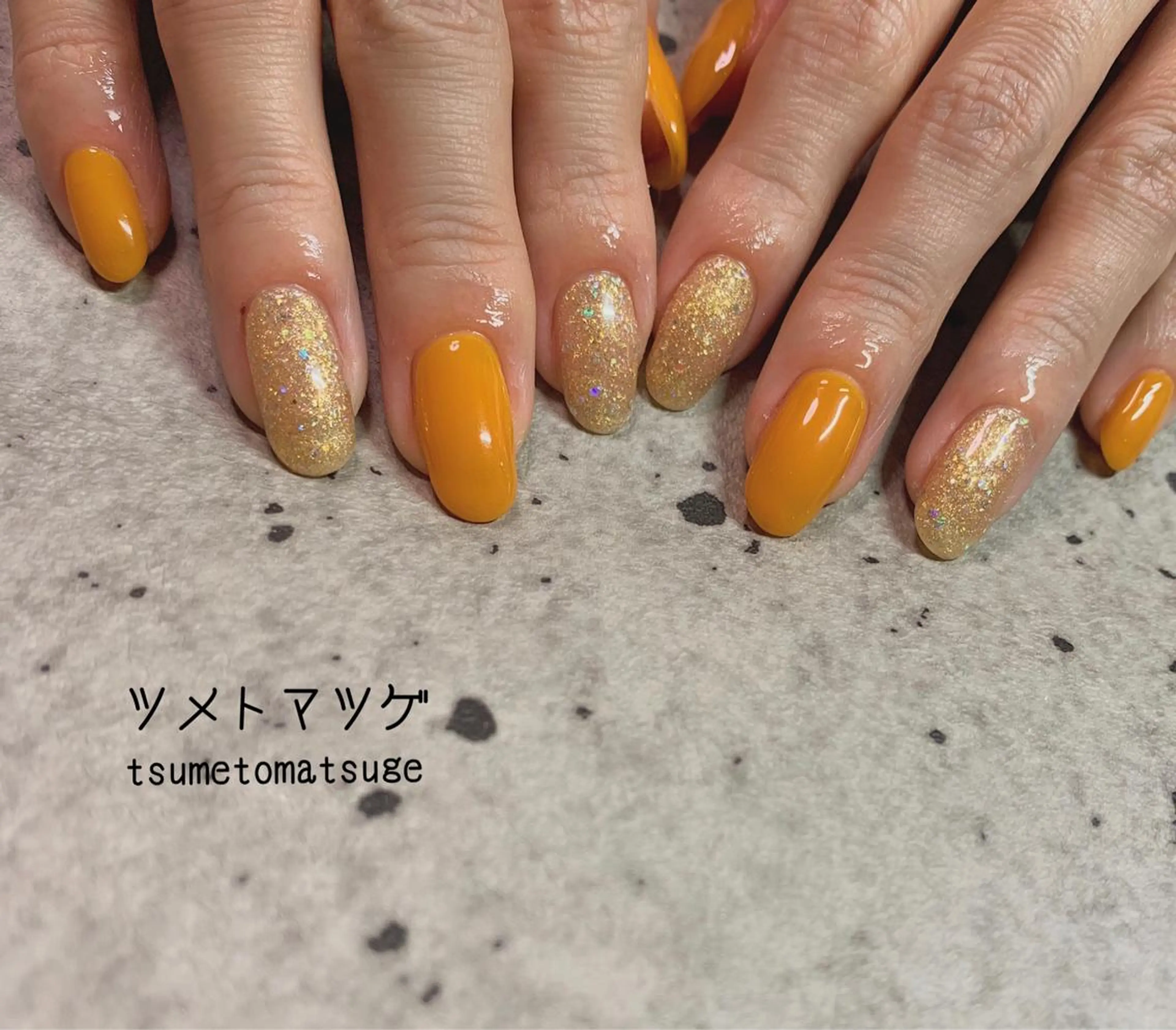 ミディアム ネイル ハンドネイル ツメトマツゲ .のネイルデザイン