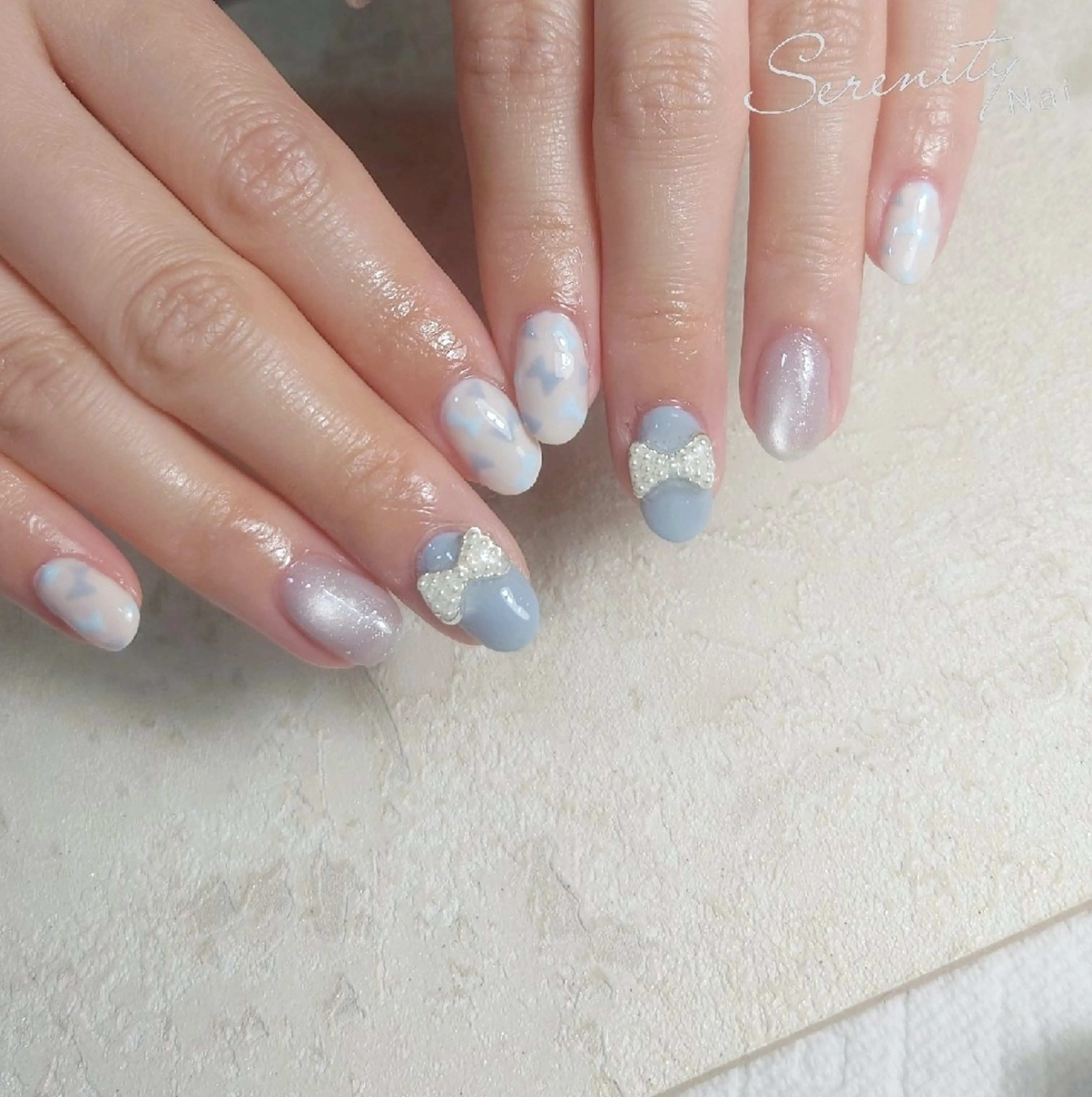 ネイル ブルー グリーン ワンカラーネイル リボン ハンドネイル nail  serenityのネイルデザイン