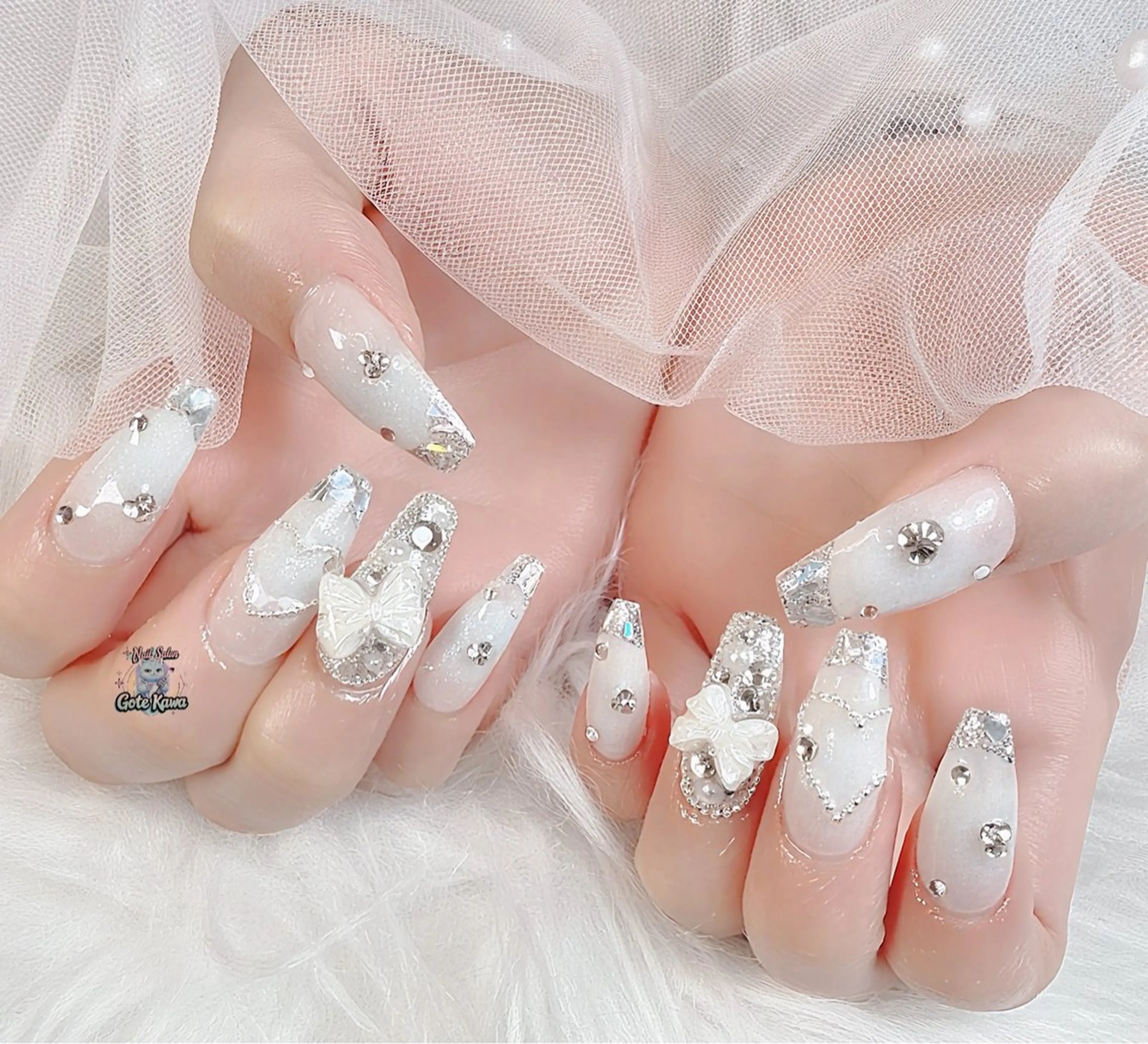 ネイル フレンチネイル ガラスフレンチ ホワイト 冬ネイル ハンドネイル ハンドケア Gote Kawa nail salonのネイルデザイン