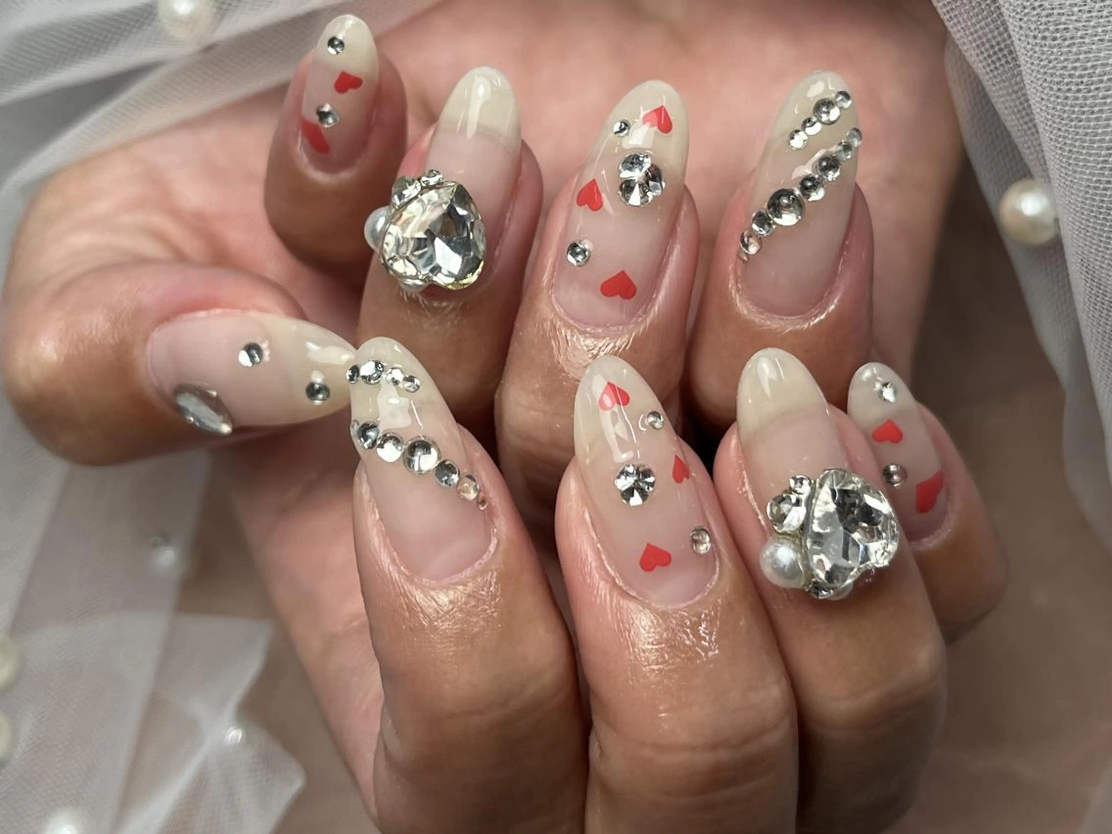ネイル クリアネイル ゴージャス ハート キラキラネイル ストーンネイル ハンドネイル ToliyDeliy Nail Salonのネイルデザイン
