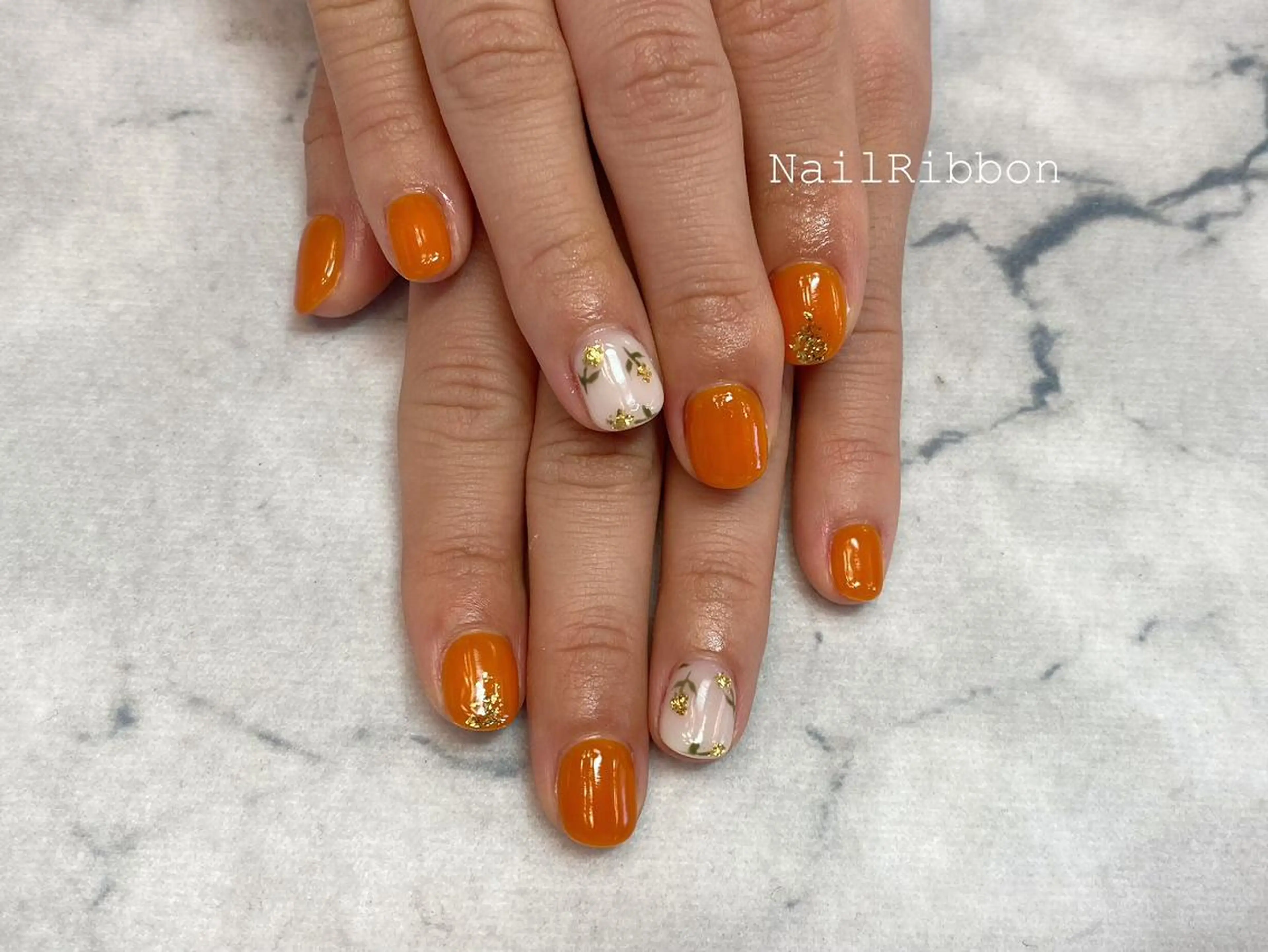 ネイル ネイルリボン 受付スタッフのネイルデザイン