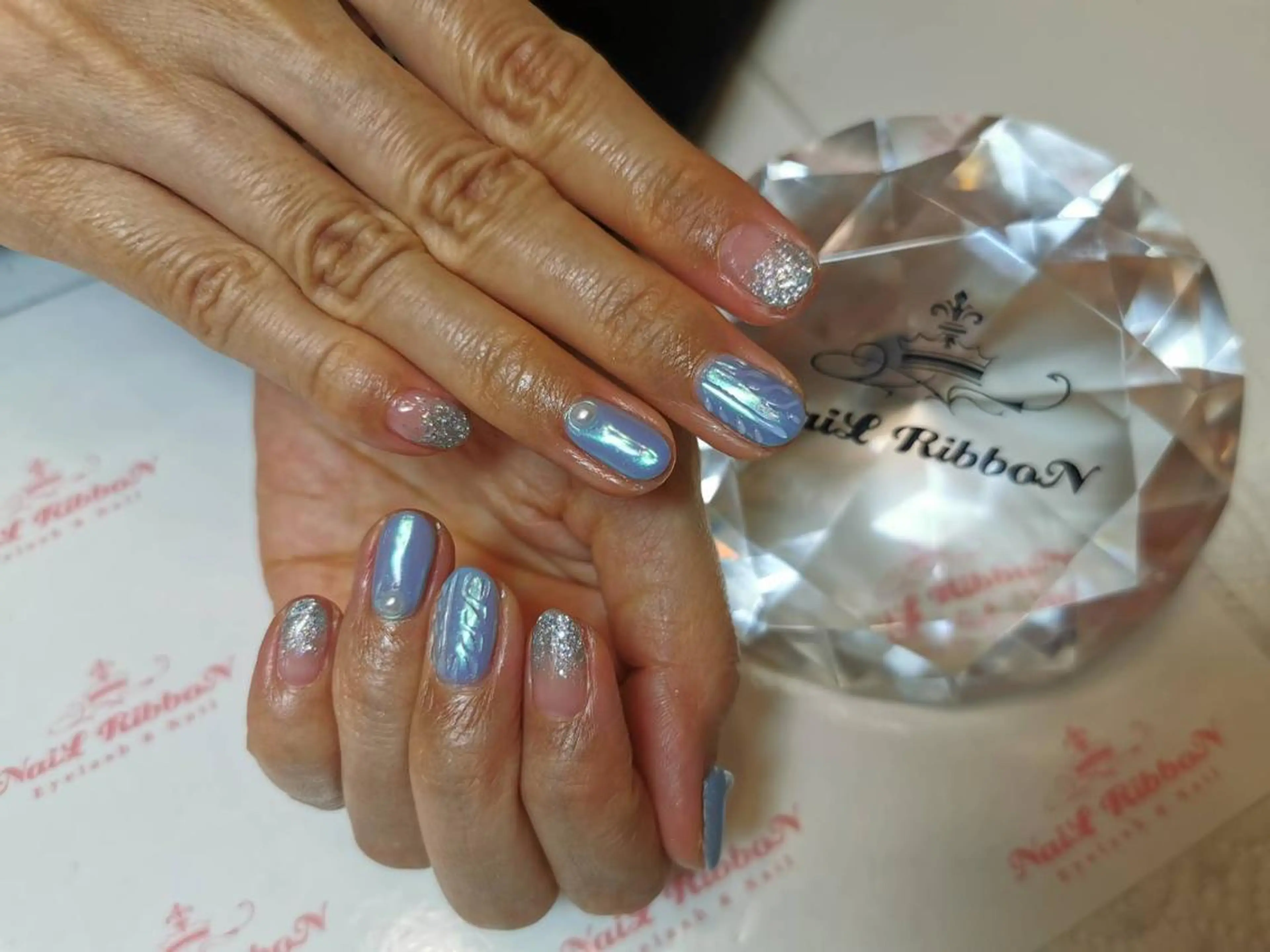ネイル ネイルリボン 受付スタッフのネイルデザイン
