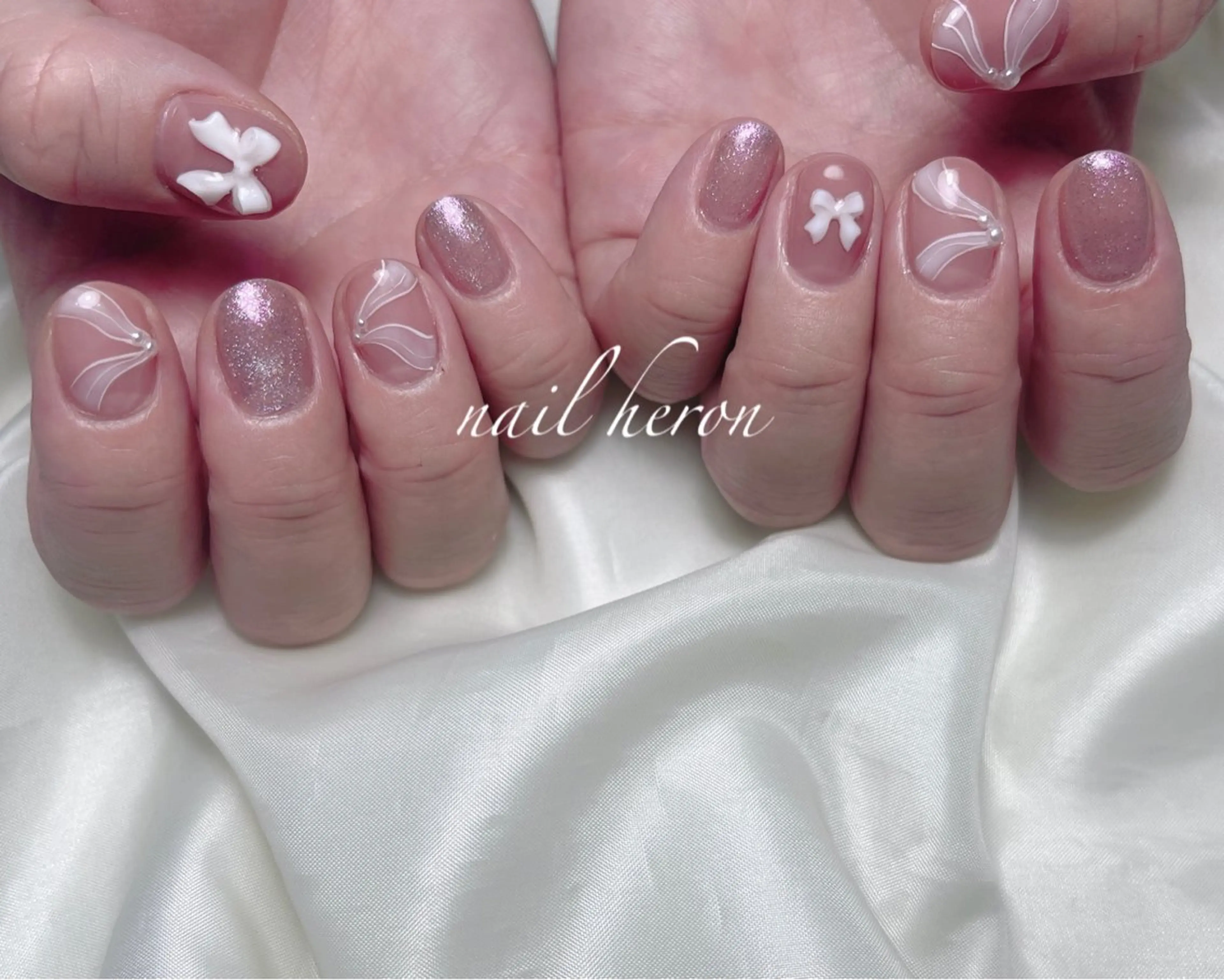 ネイル リボン ハンドネイル saki_ nail heronのネイルデザイン