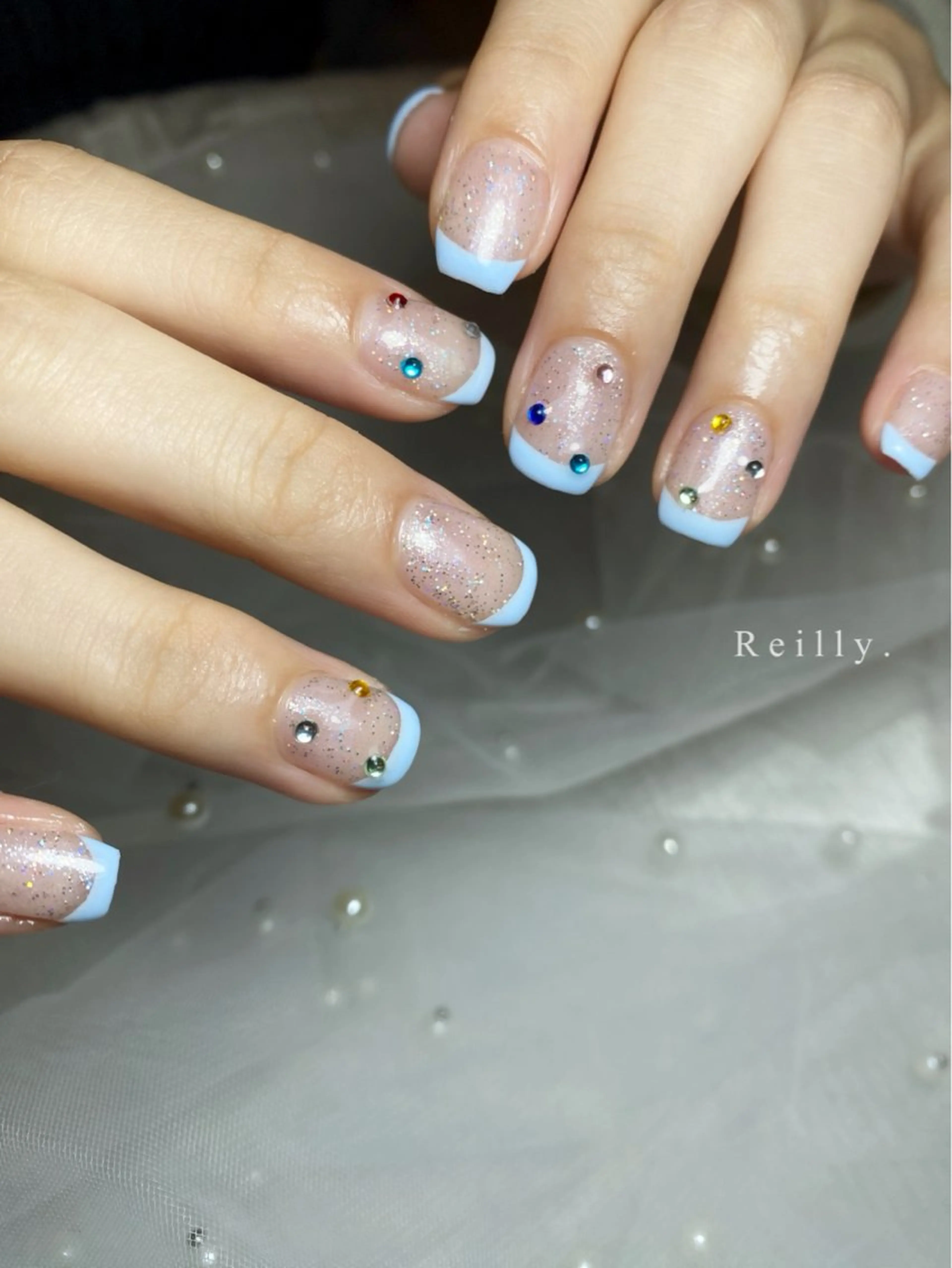 ネイル フラッシュネイル フレンチネイル ジェルネイル グラデーション ラメ(グリッター) Marina 《REILLY.》のネイルデザイン