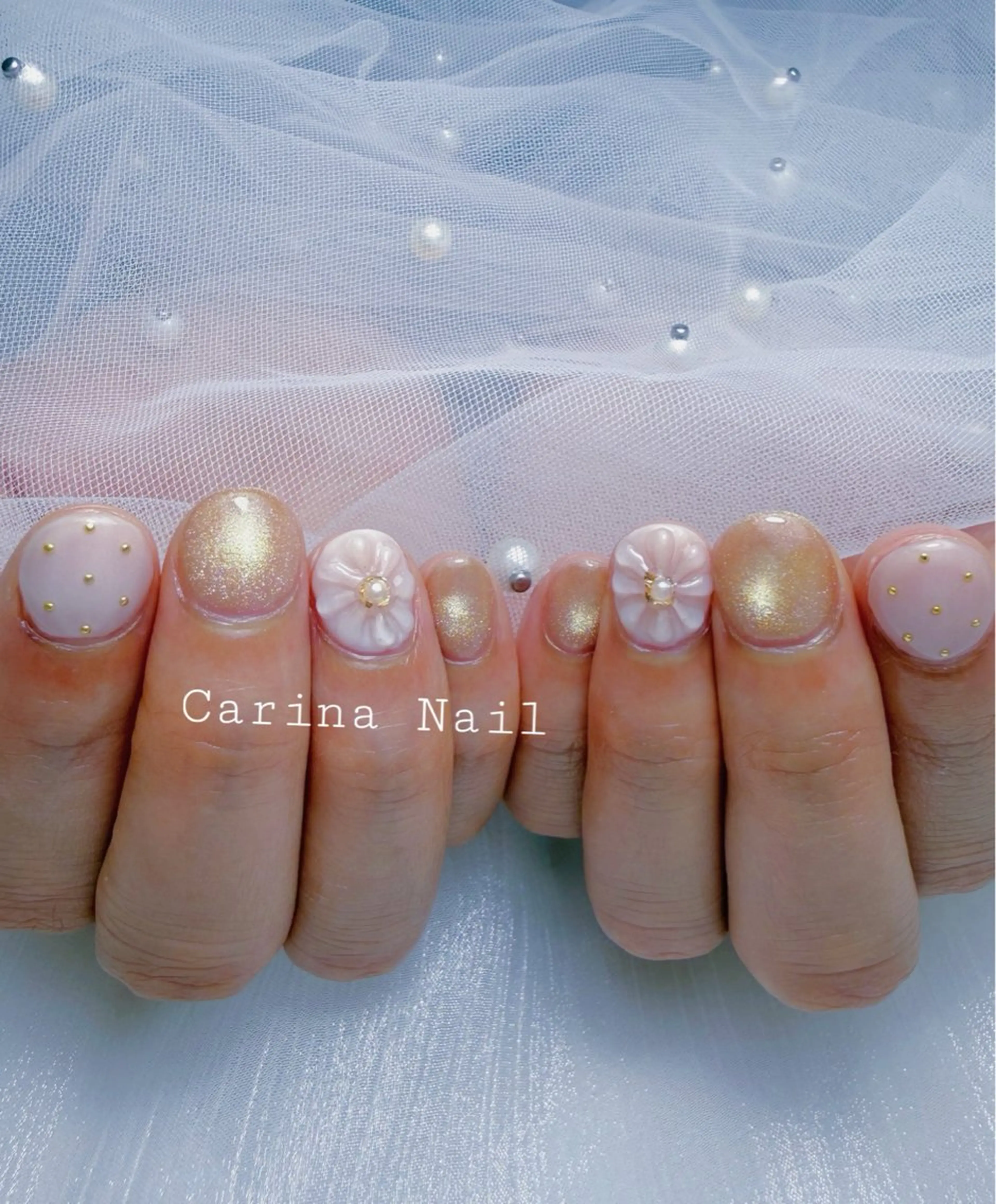 ネイル フラワーネイル ゴールド Carina Nailのネイルデザイン
