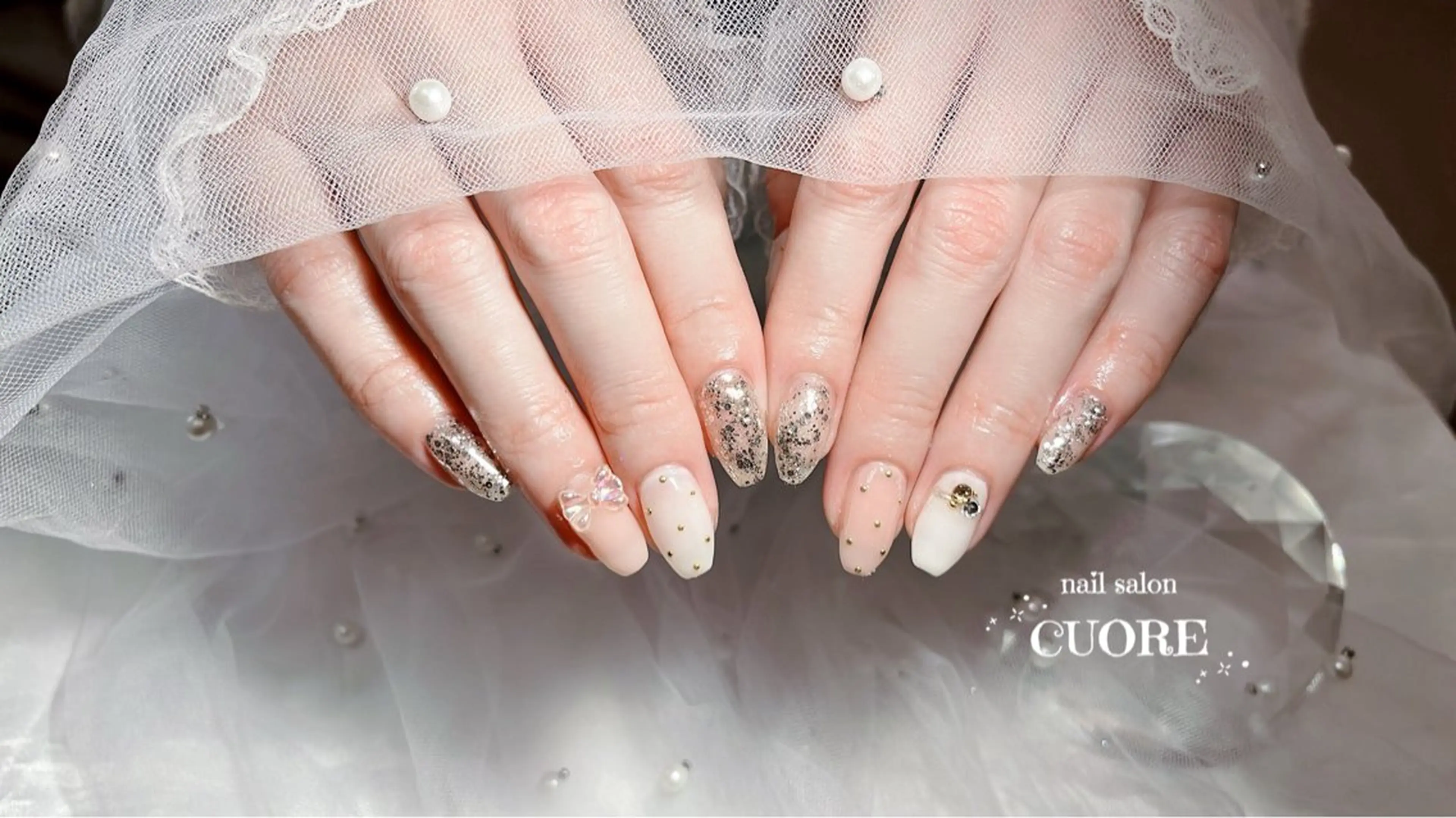 ネイル リボン シンプルネイル 春ネイル ホワイト nail salon CUOREのネイルデザイン