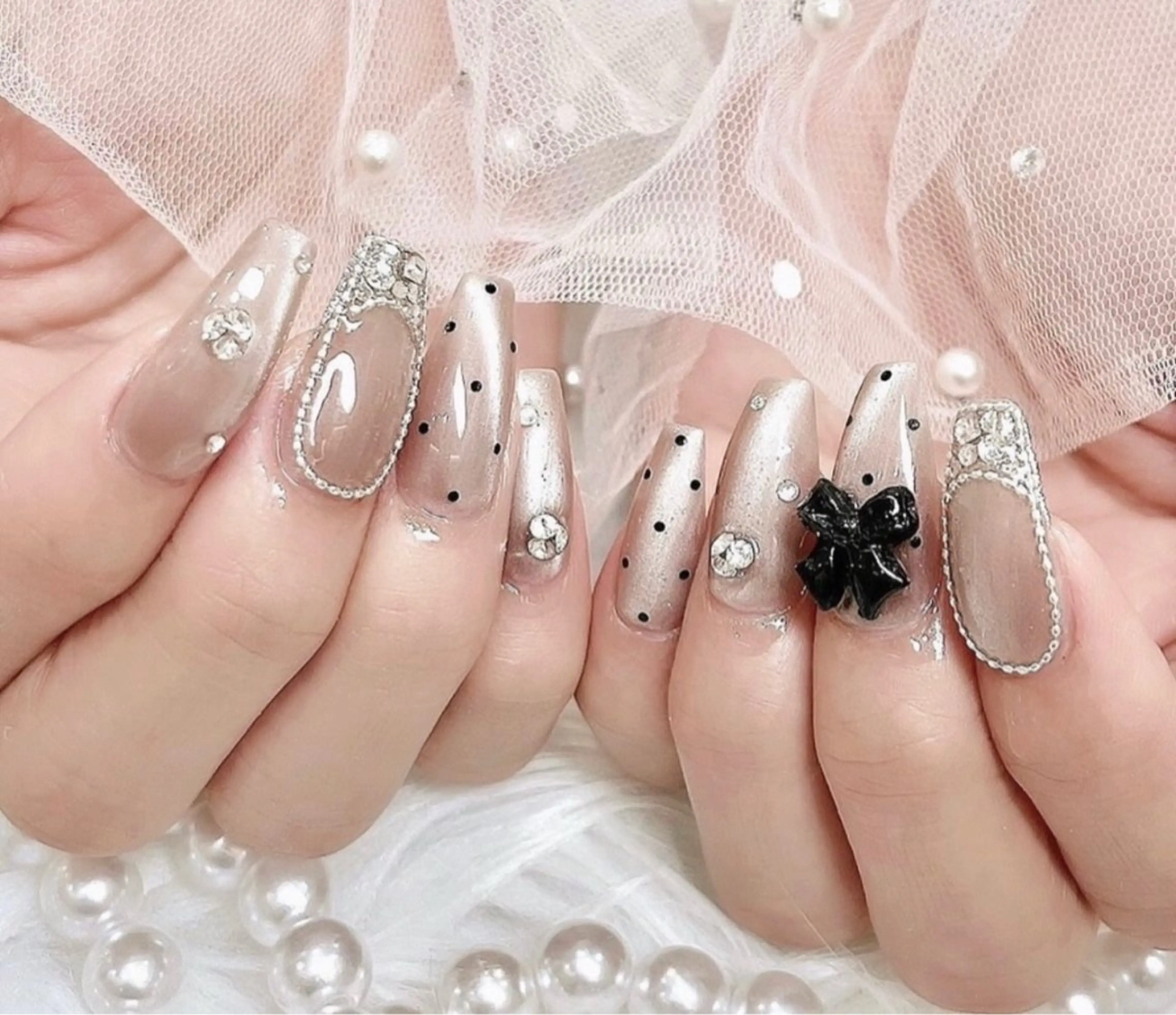 ネイル 成人式 ロングネイル マグネットネイル 大理石ネイル(マーブル) リボン ハンドネイル Amee Nail Salonのネイルデザイン