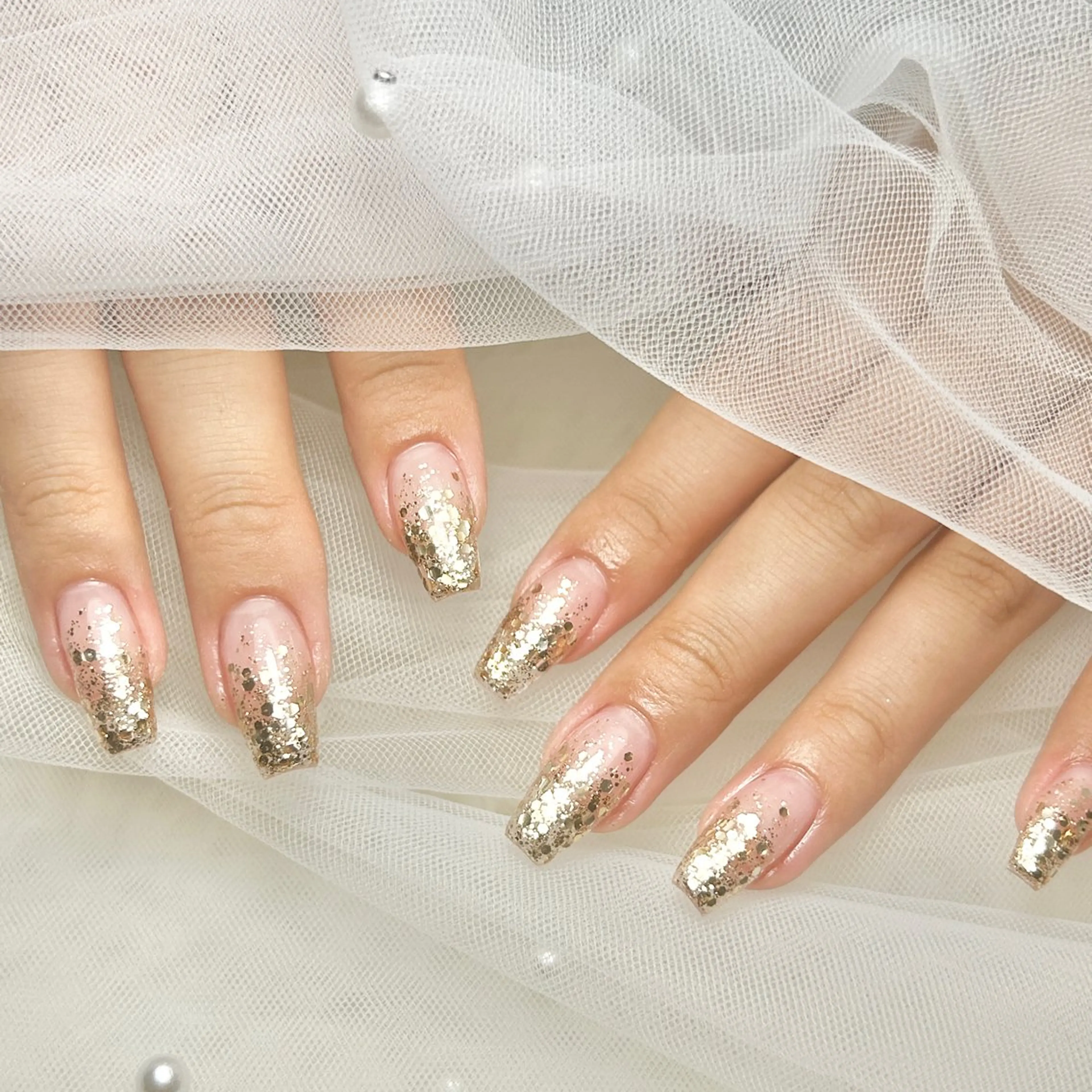 長さだしスカルプ  ラメグラデーションの写真