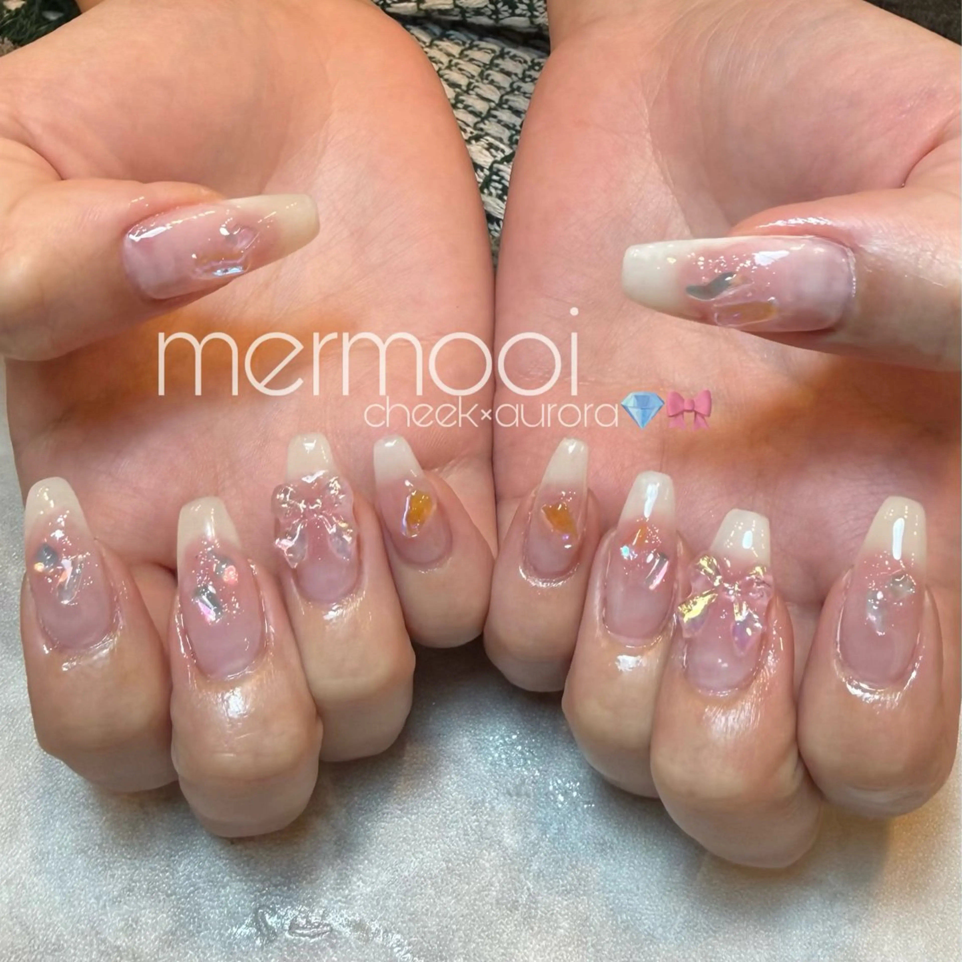 ネイル オーロラネイル チークネイル ロングネイル ピンク リボン ハンドネイル melumooi nailのネイルデザイン