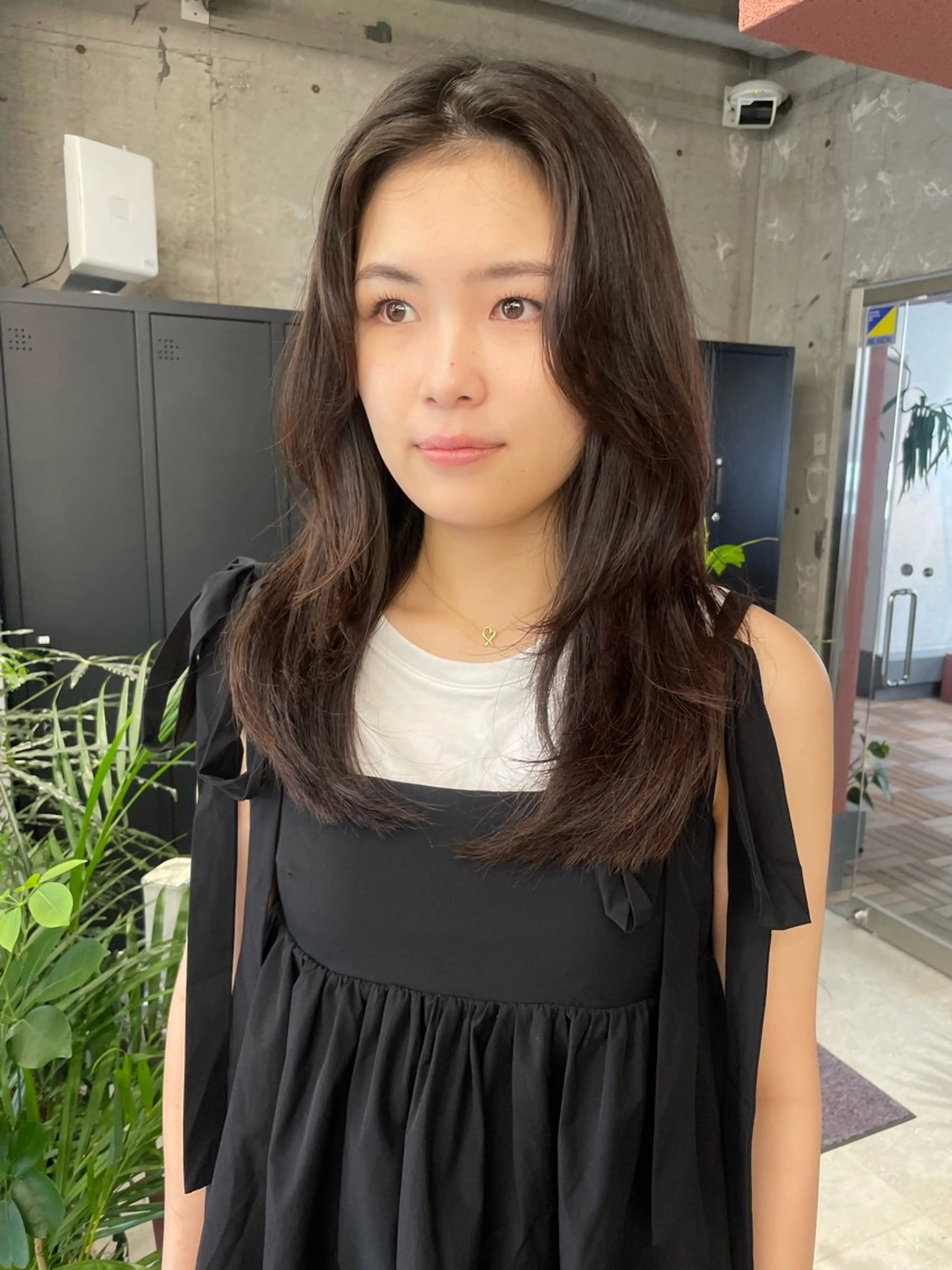 ロング MIFA レイヤー／パーマのヘアスタイル