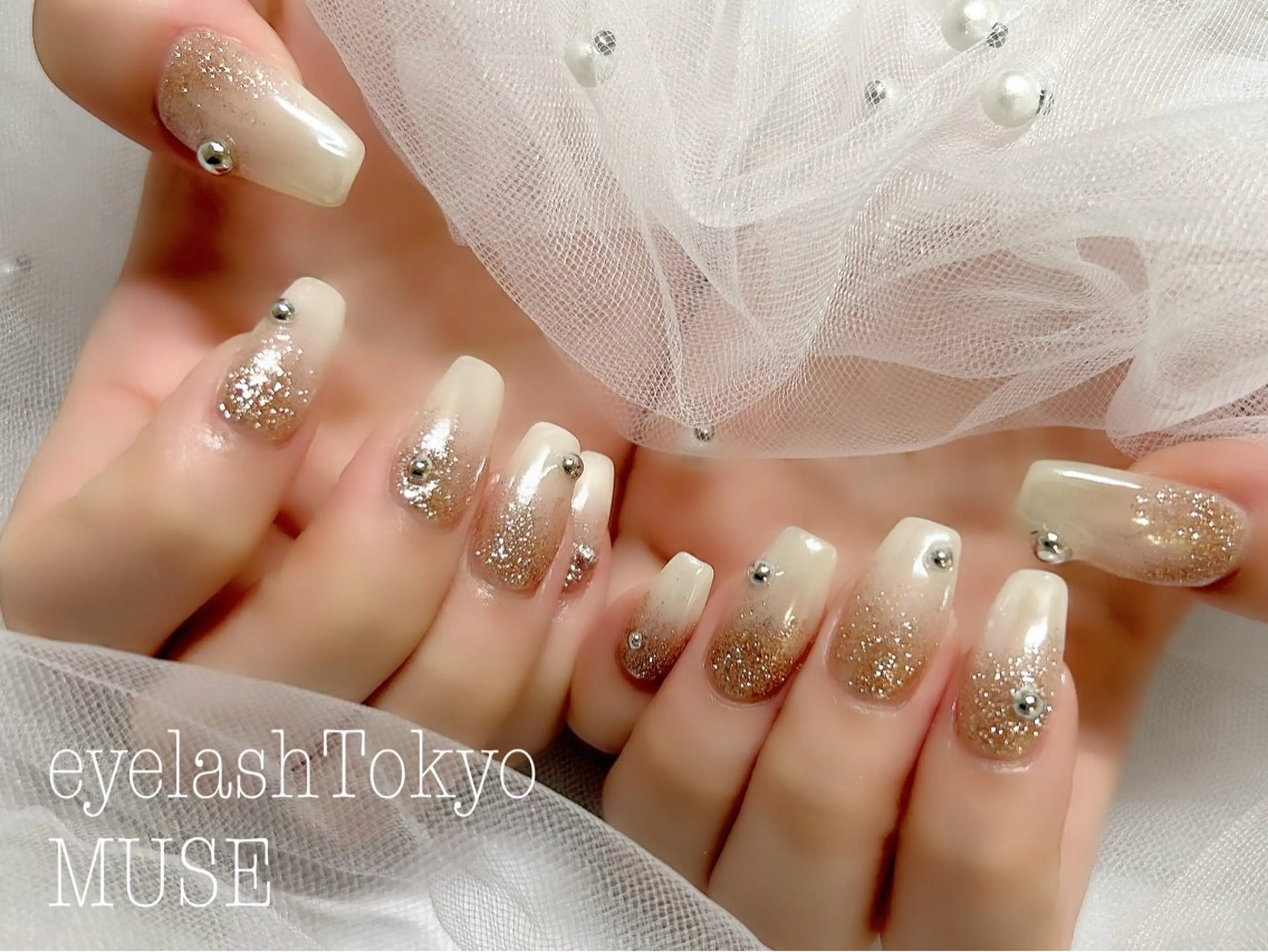 ネイル オーロラネイル ラメ(グリッター) ピンク ホワイト 冬ネイル ハンドネイル tanaka ◡̈のネイルデザイン