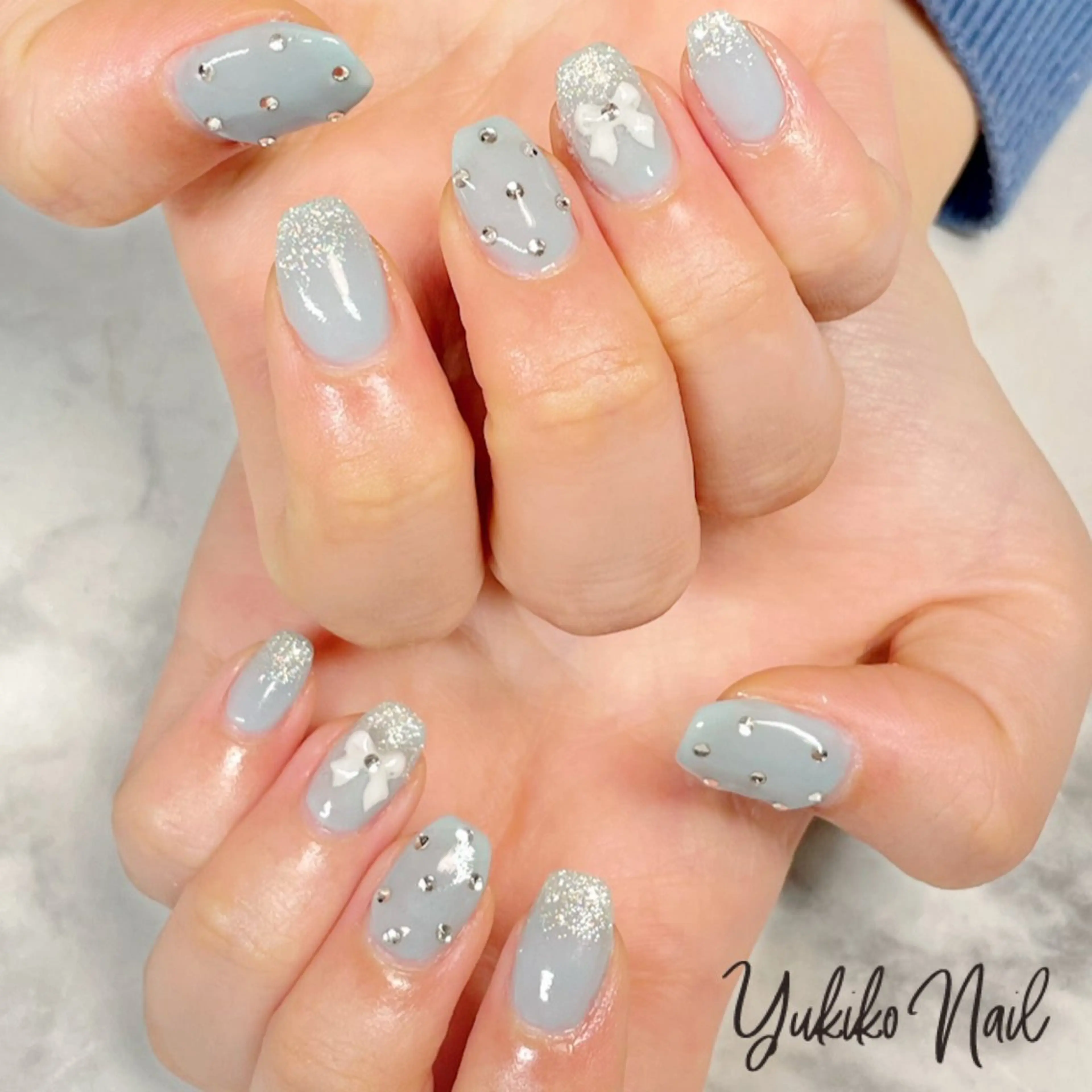 ネイル ブルー ガーリー 韓国ネイル リボン ストーンネイル ハンドネイル ユキコ ネイルのネイルデザイン