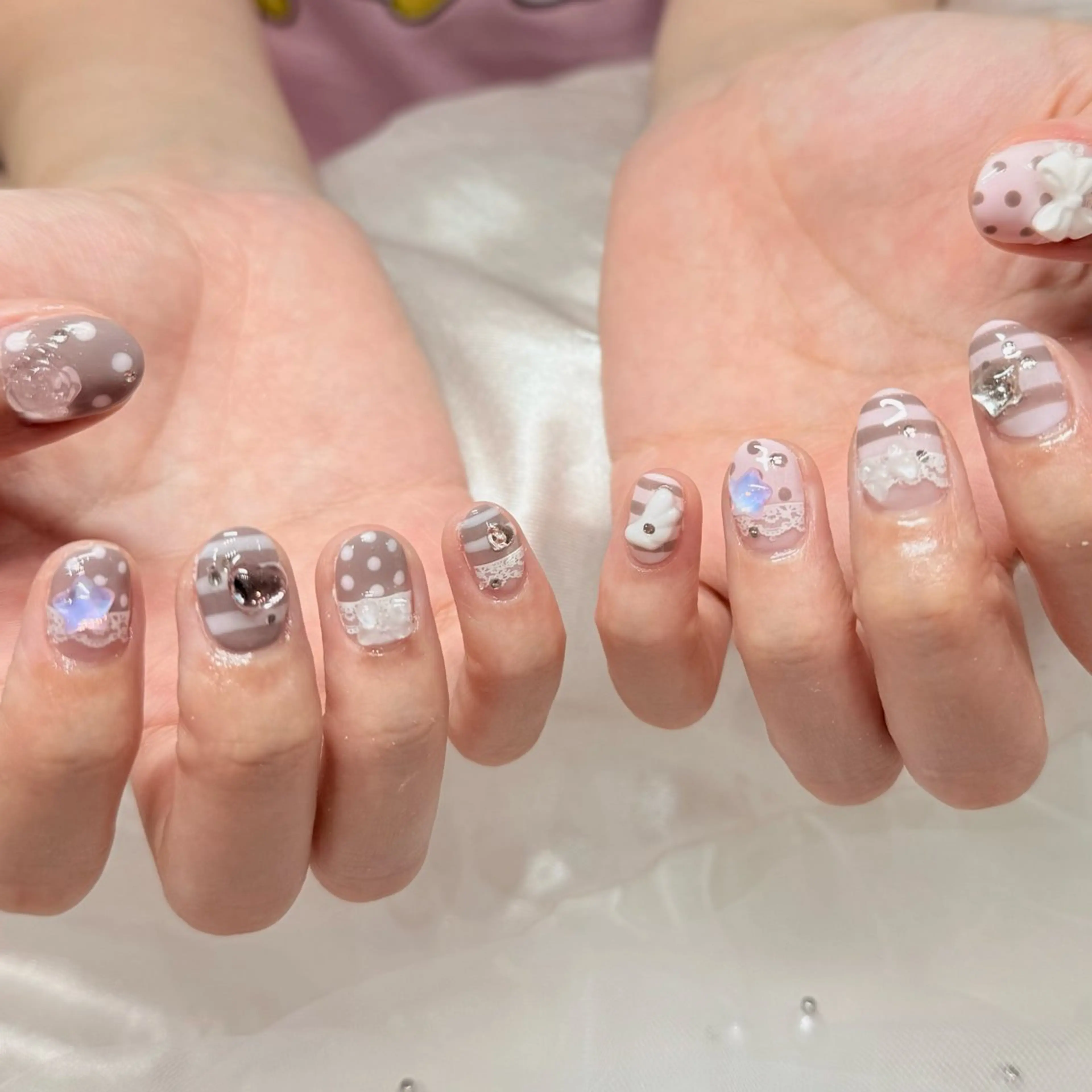 ネイル リボン ハンドネイル Roy心斎橋 ISHIKAWAのネイルデザイン