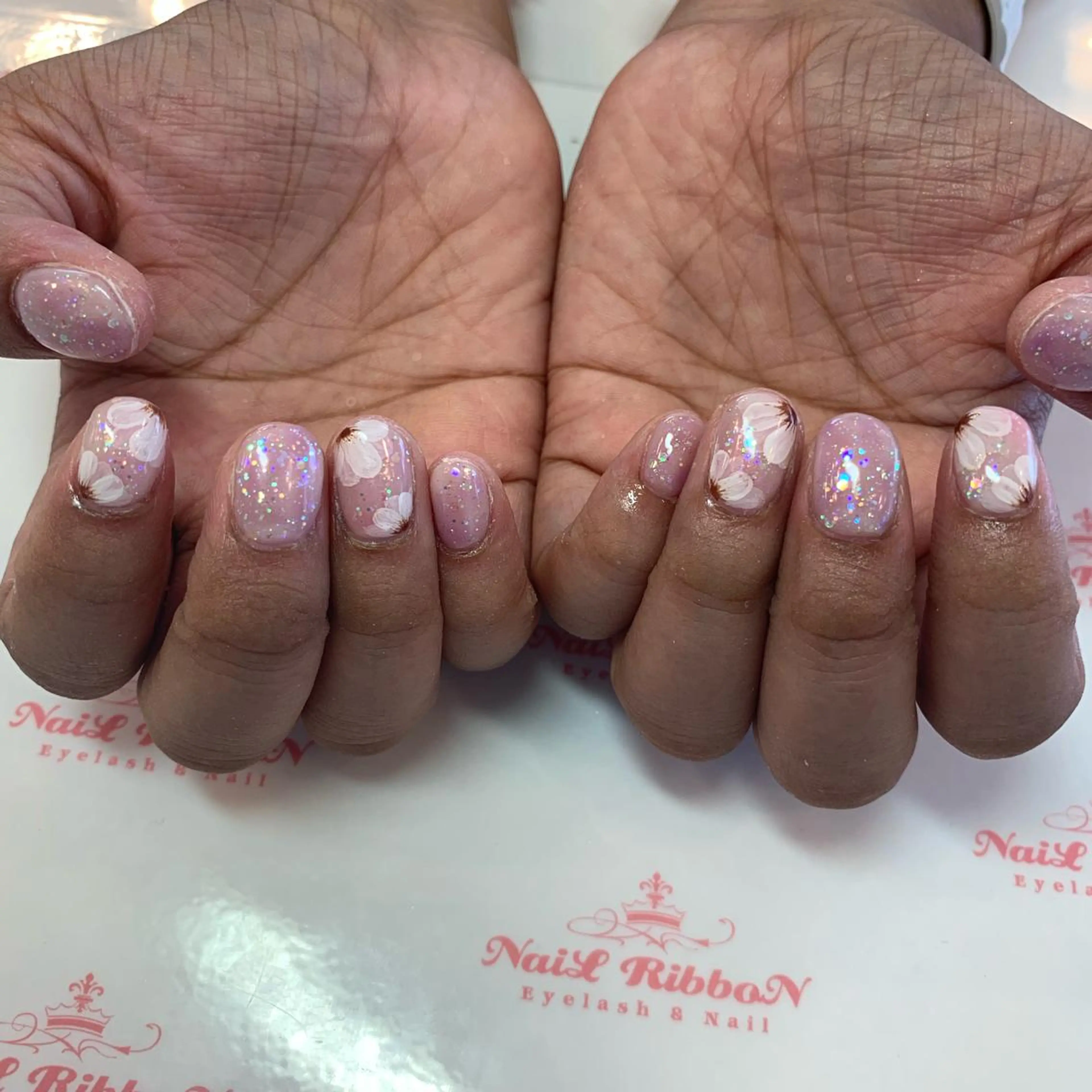 ネイル ネイルリボン 受付スタッフのネイルデザイン