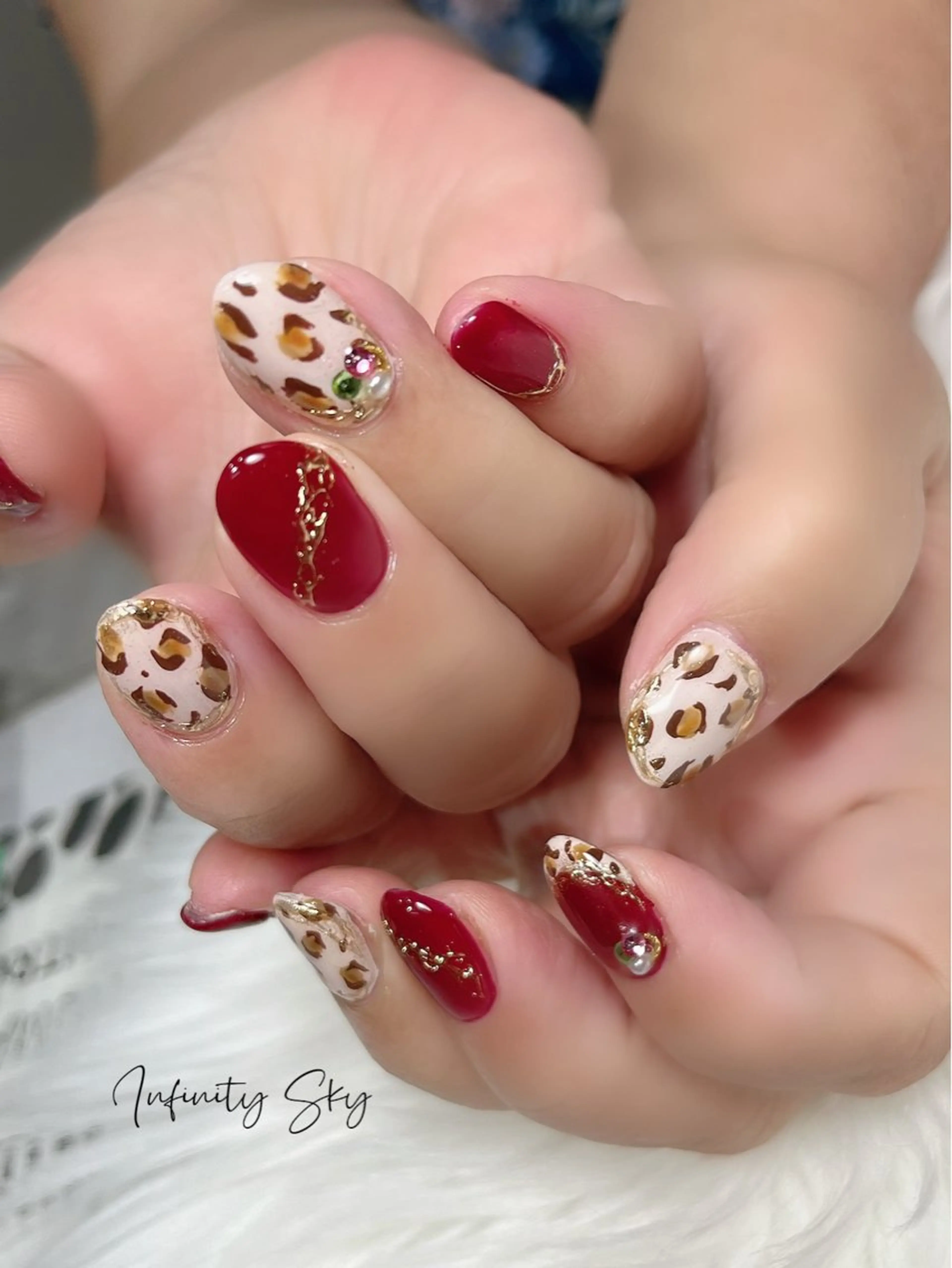 ネイル アニマル柄 アートネイル 赤色 infinity skyのネイルデザイン