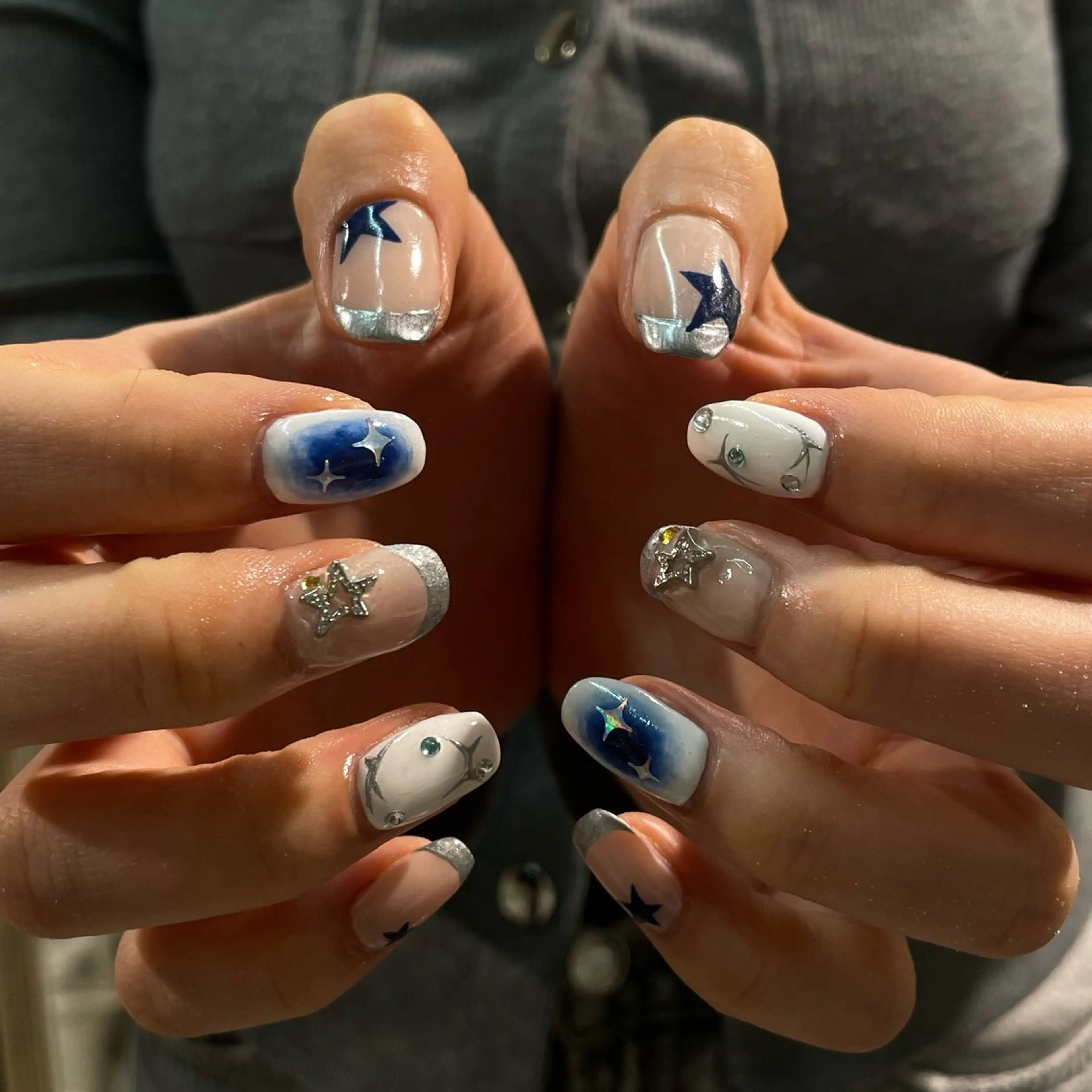 ネイル AMRITA omotesando所属・艶カラー・:*個性派 ネイル🦋mire-のネイルデザイン